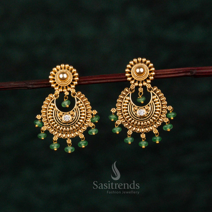 Sacred white circular floral temple earrings adorned with illustrious crescent motifs, resplendent matte gold finish, aristocratic craftsmanship, and celestial elegance for heritage occasions – Sasitrends