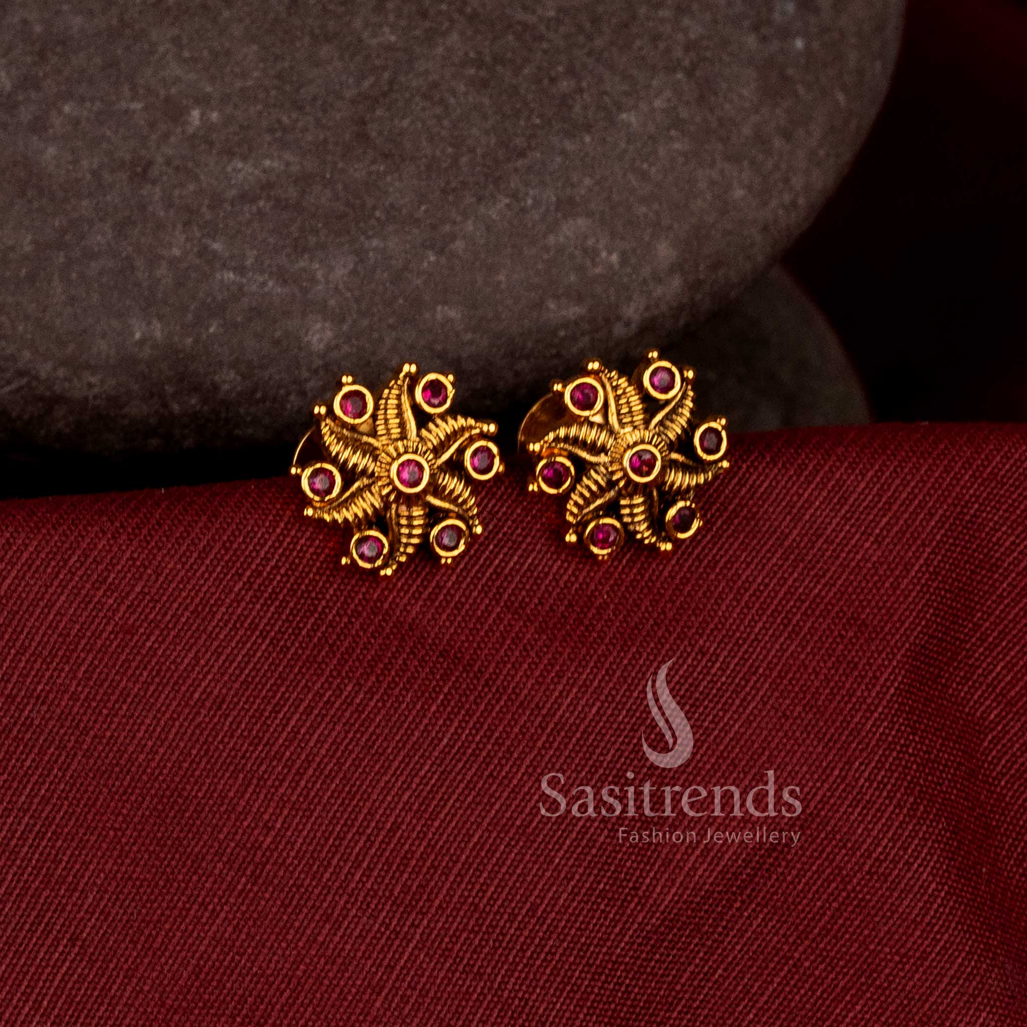 Simple circular star swirl stud earrings crafted with premium matte gold plated finish - Sasitrends