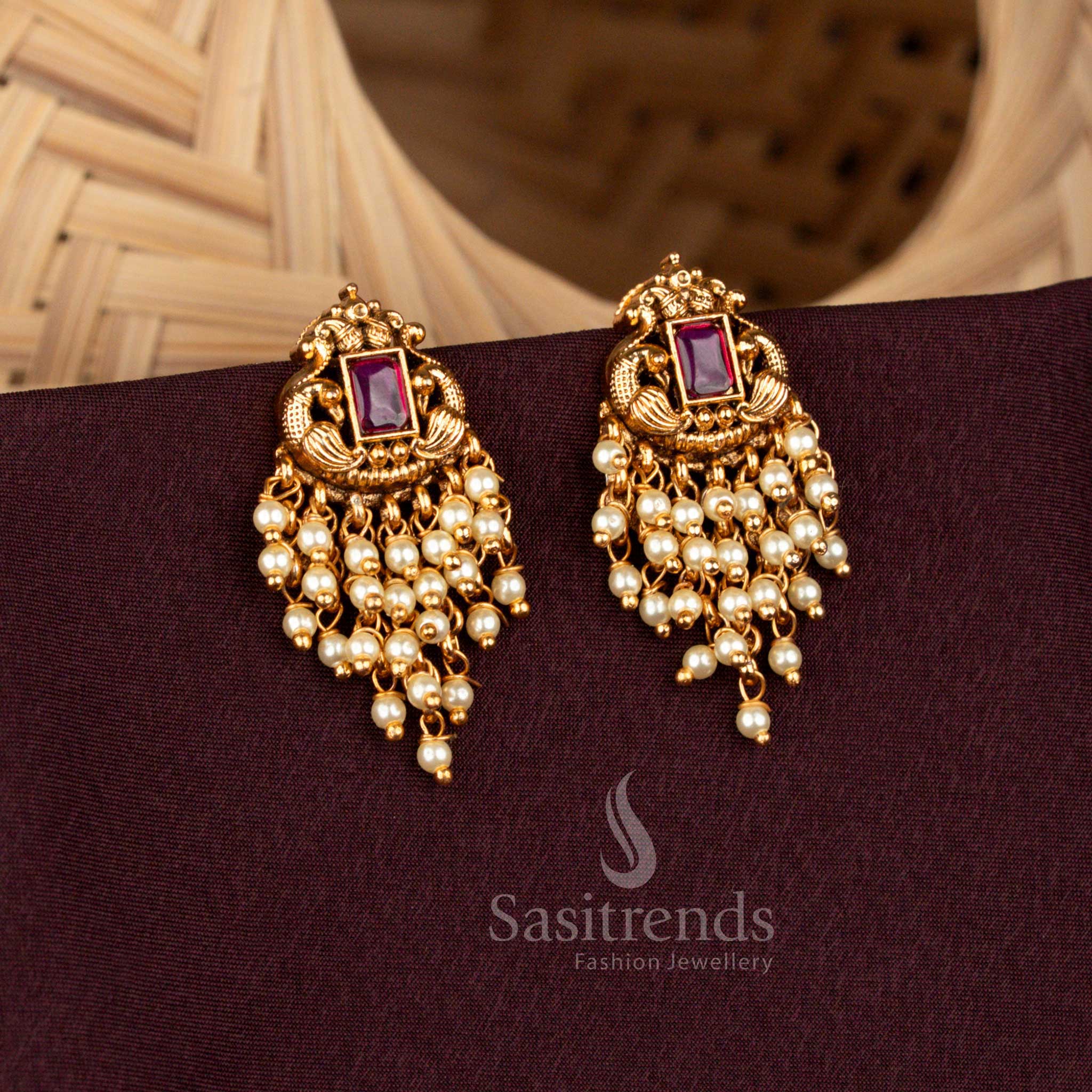 Premium temple peacock earrings with hanging pearls and beads 