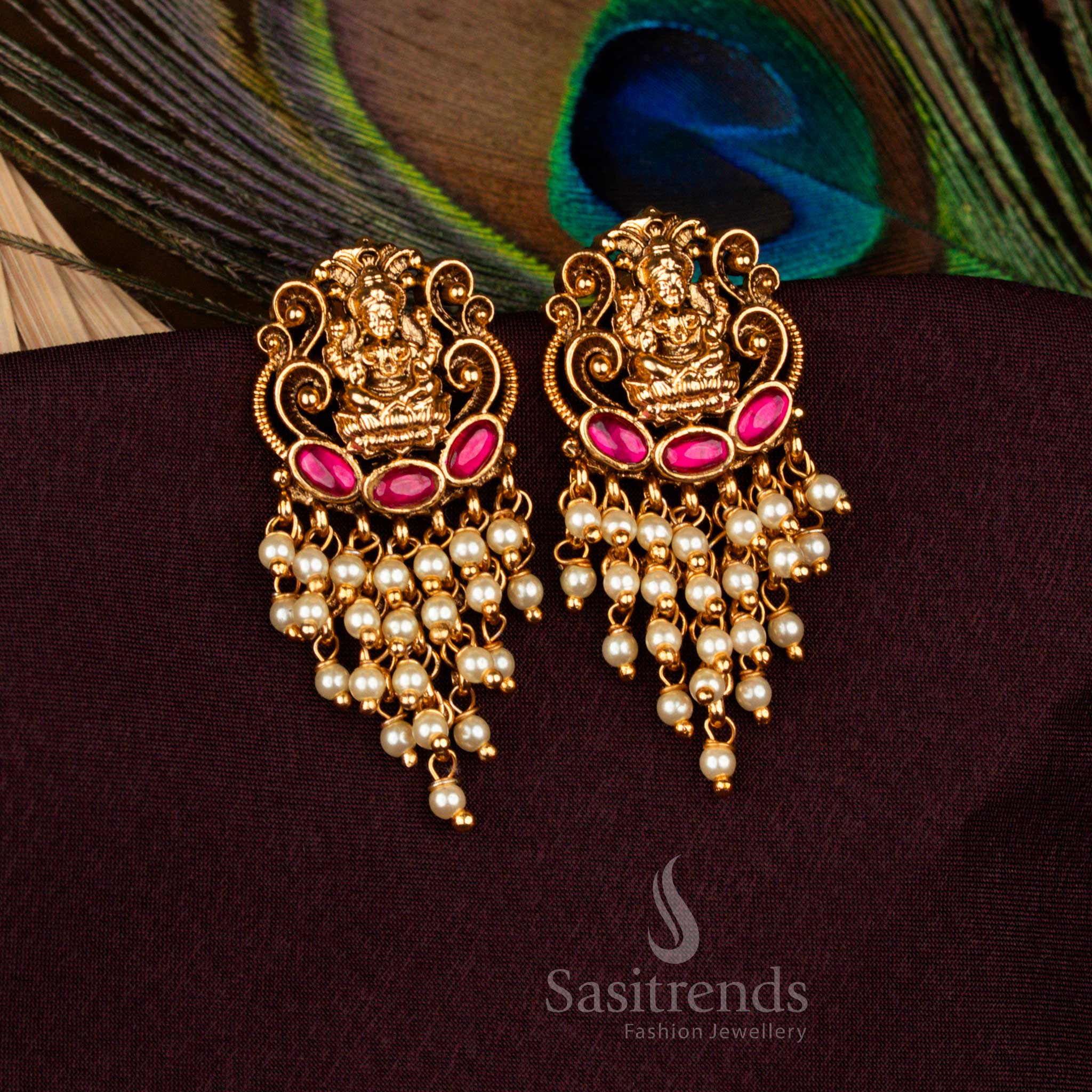 Divine temple earrings with ornate Lakshmi carving and cascading beads – Sasitrends