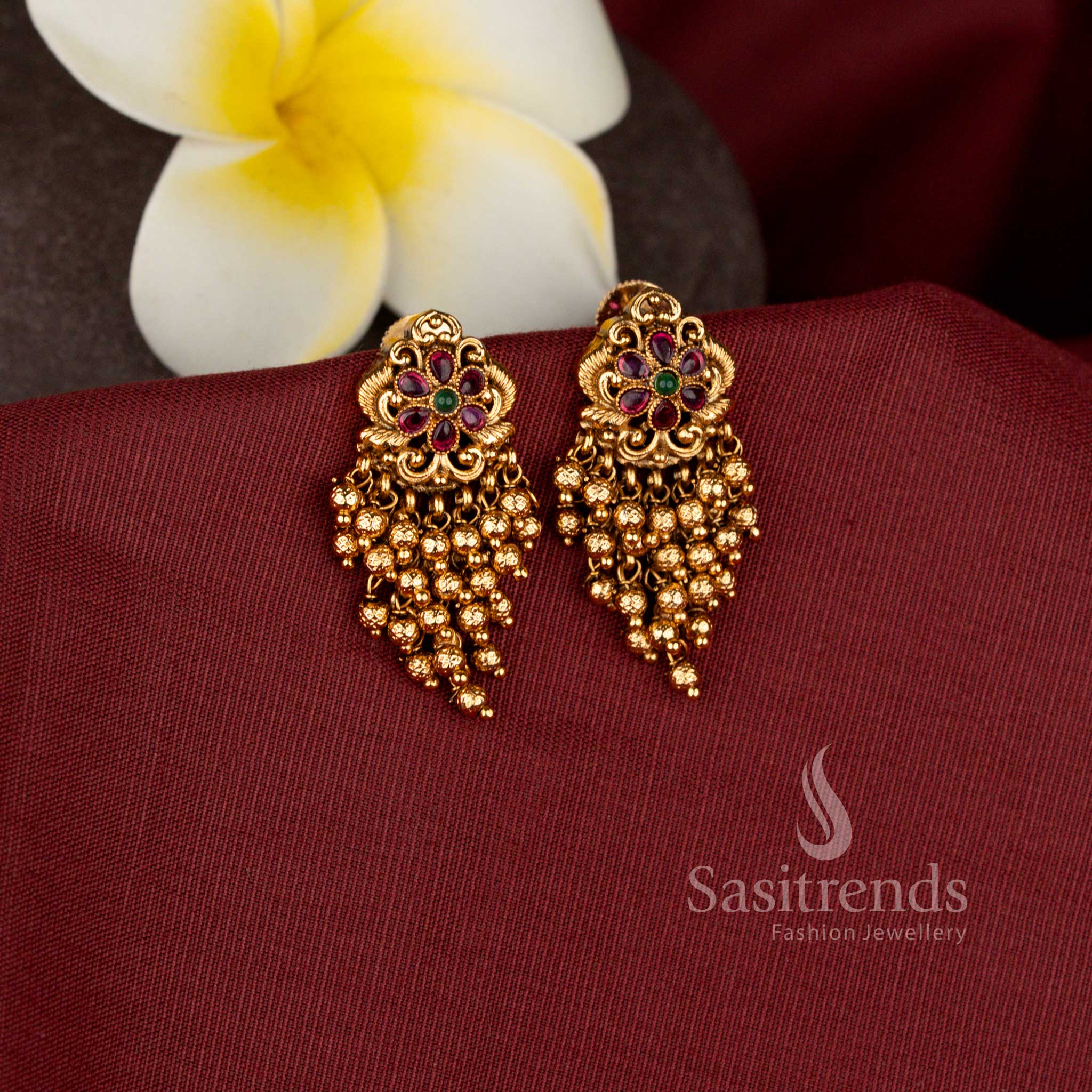 Traditional Floral Gold Beads Tassel Earrings for Festive Wear - Sasitrends
