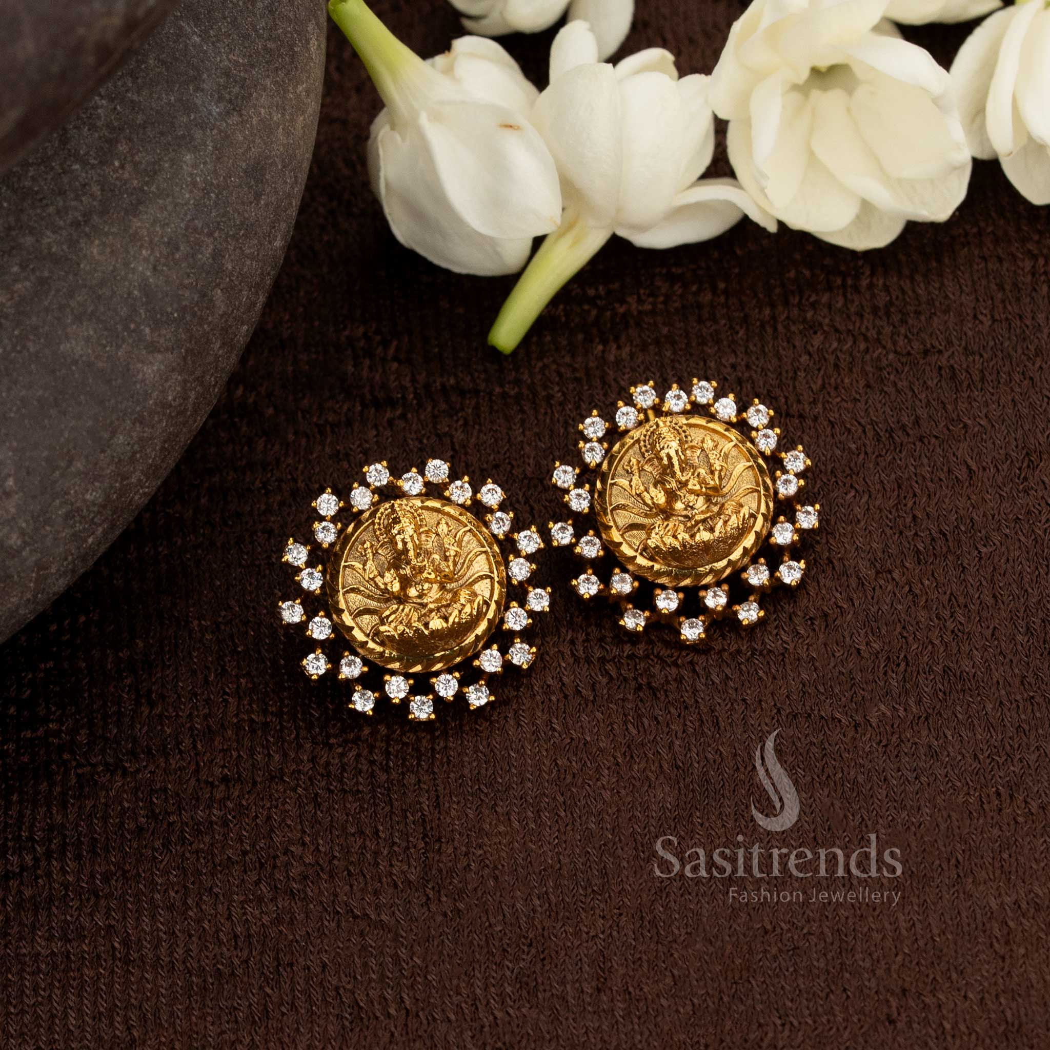 Divine Lord Ganapathy embossed temple matte gold plated white earrings with stone accents, ideal for weddings – Sasitrends