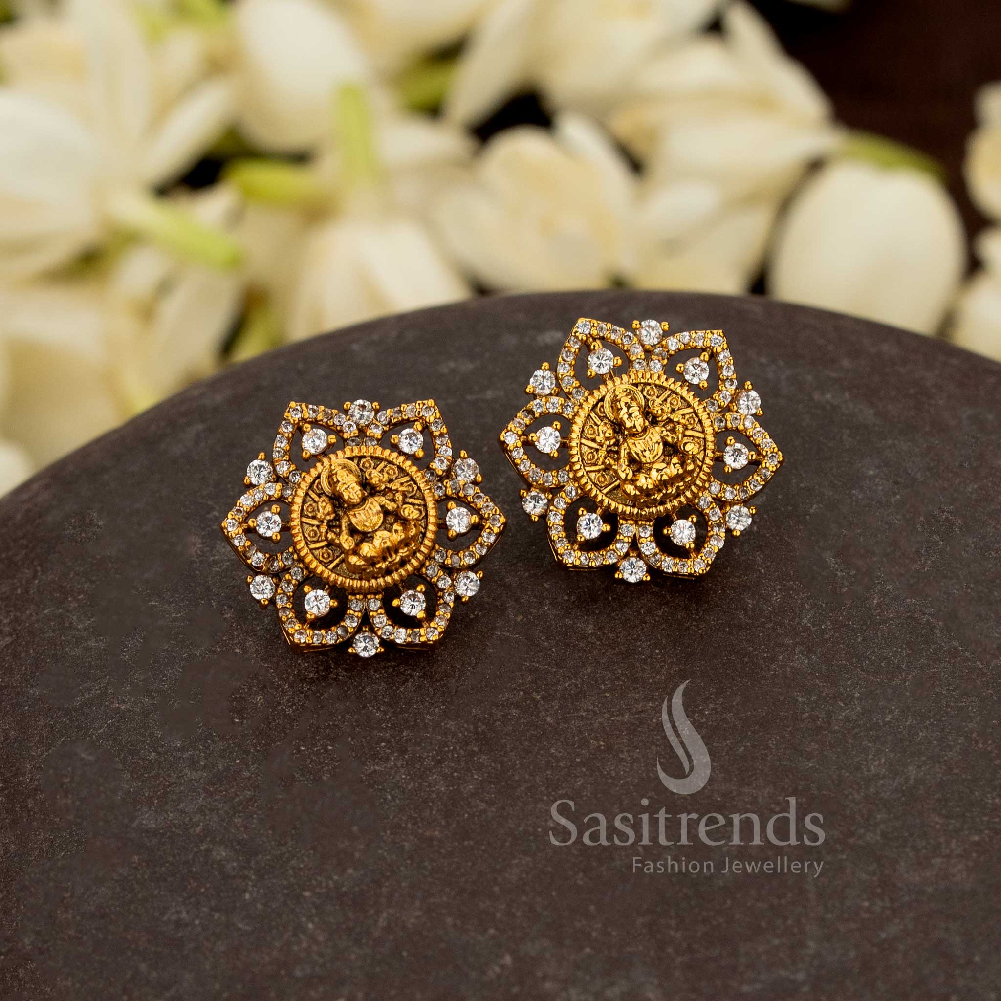 Opulent temple-inspired Lakshmi stud earrings with lotus openwork and radiant halo stones