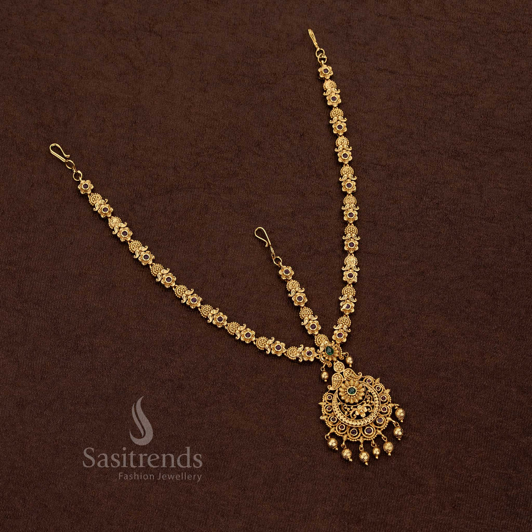 Regal matte gold floral three layer Ruby-Green tikka with traditional design for grand weddings - Sasitrends