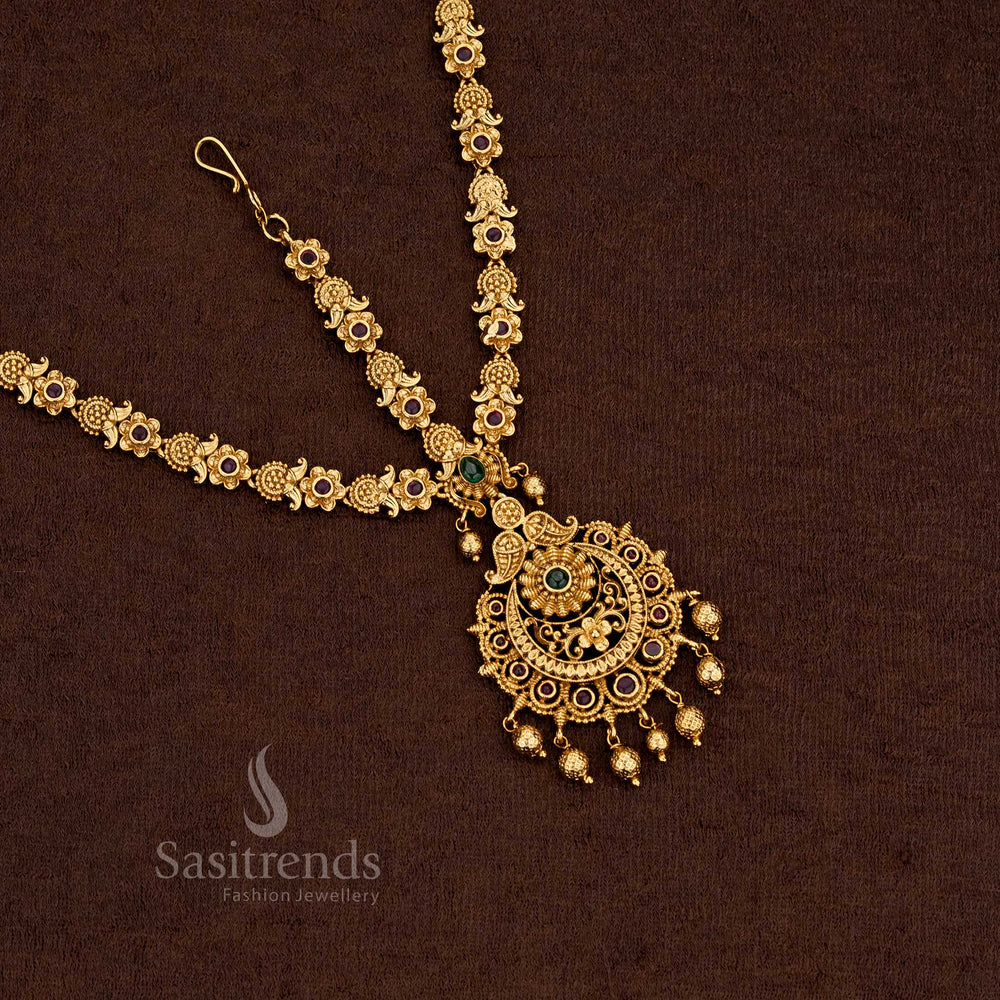 Splendid matte gold floral three layer Ruby-green tikka with intricate traditional artistry - Sasitrends