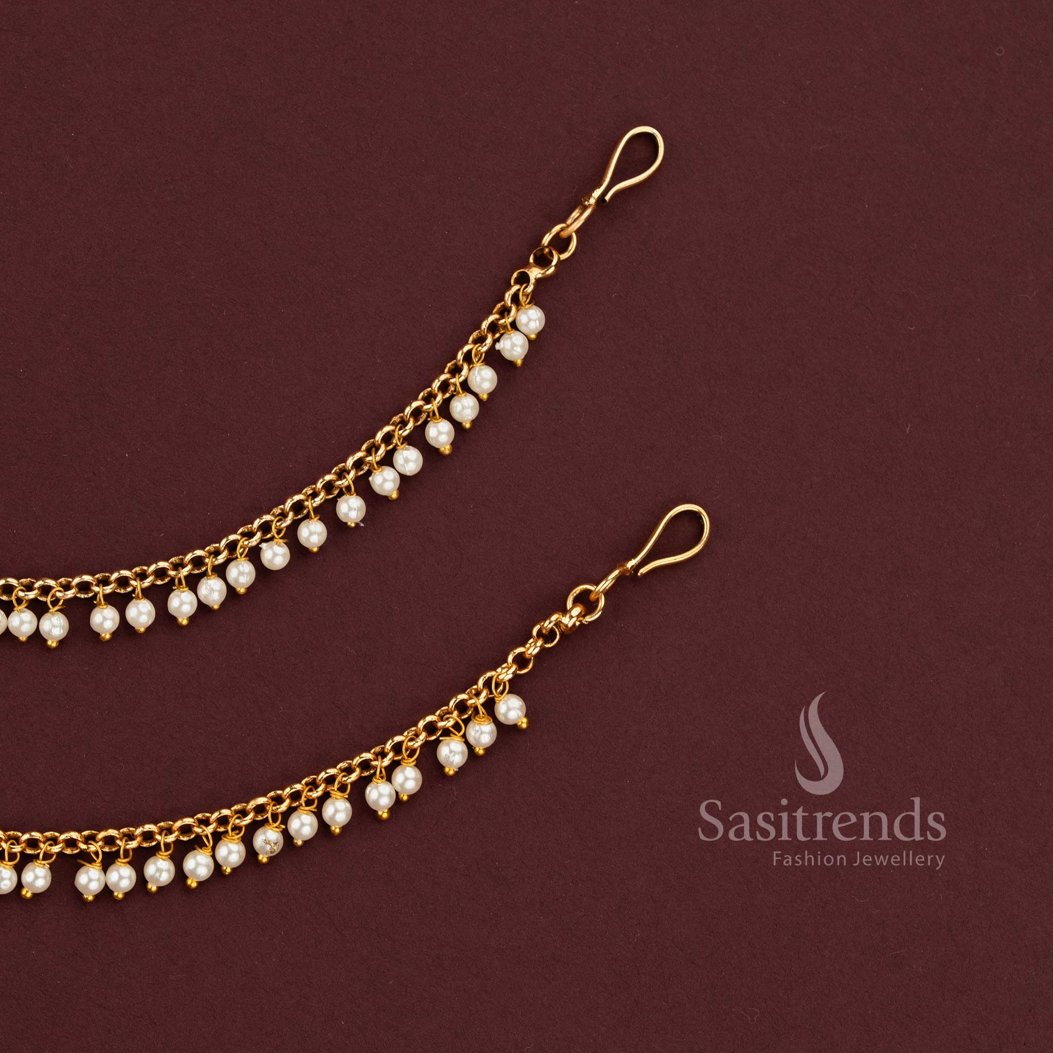 Opulent one Layer Gold Plated Matil With Flowing Pearl Hangings Designed To Elevate Bridal Sarees And Designer Lehenga Ensembles - Sasitrends