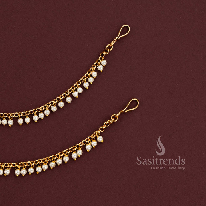 Opulent one Layer Gold Plated Matil With Flowing Pearl Hangings Designed To Elevate Bridal Sarees And Designer Lehenga Ensembles - Sasitrends