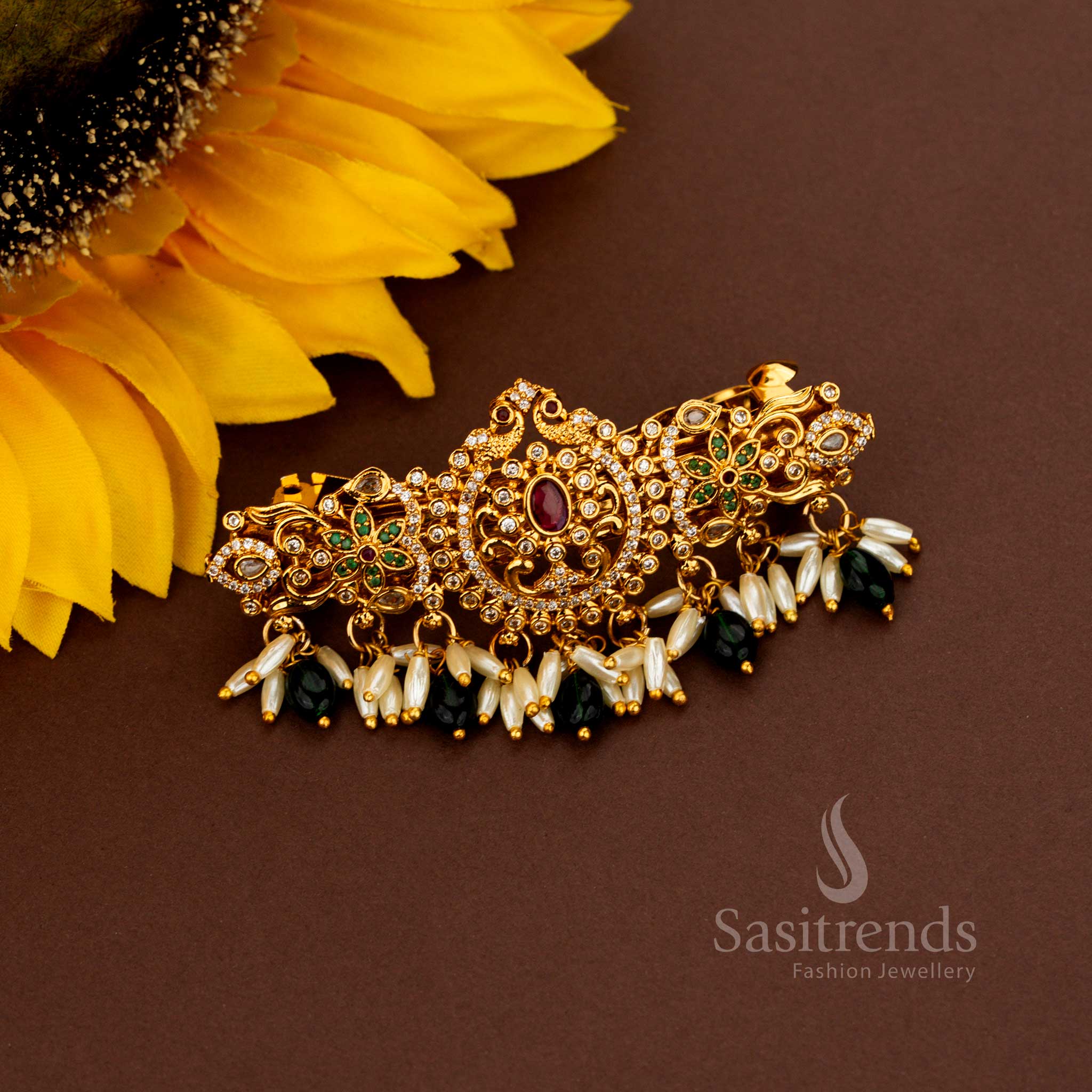 Grandiose dark green AD rice pearl hair clip adorned with opulent peacock designs illustrious matte gold craftsmanship eternal floral grandeur and noble jewellery splendour – Sasitrends