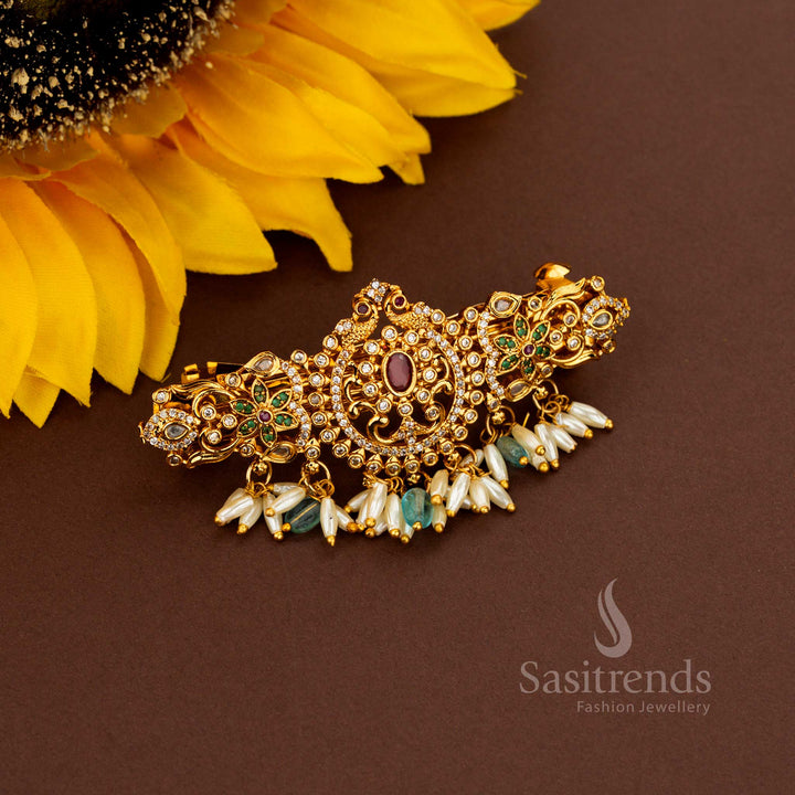 Gorgeous Matte Gold Plated Oval Shaped Floral Dual Peacock AD Rice Pearl Hair Clip For Bridal Elegance