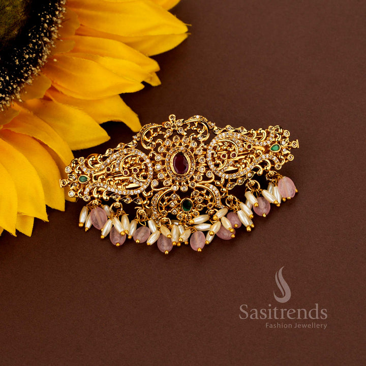 Magnificent pink AD rice pearl hair clip designed with aristocratic oval floral craftsmanship radiant matte gold finish regal artistry and divine heritage beauty created for opulent ceremonies – Sasitrends