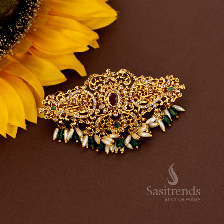 Splendid green AD rice pearl hair clip showcasing resplendent oval floral temple design opulent matte gold artistry noble elegance and celestial refinement ideal for illustrious bridal gatherings – Sasitrends
