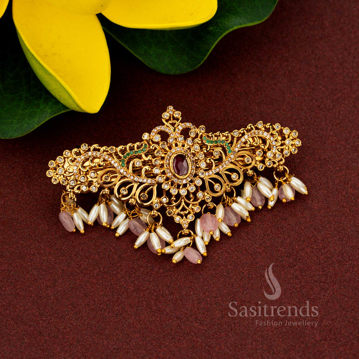 Festive oval-shaped AD hair clip with rice pearls and intricate floral design