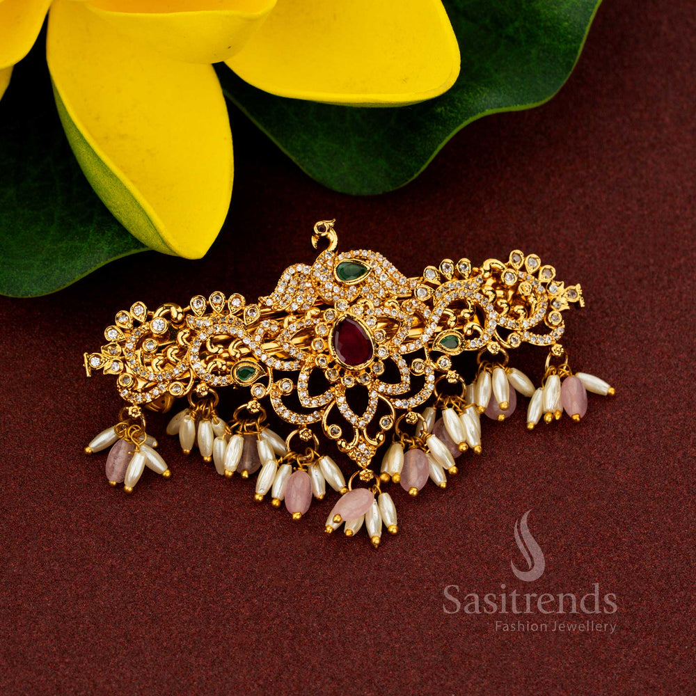 Celestial pink AD rice pearl hair clip styled with regal temple peacock artistry radiant matte gold finish noble floral refinement and resplendent heritage craftsmanship created for divine bridal elegance – Sasitrends