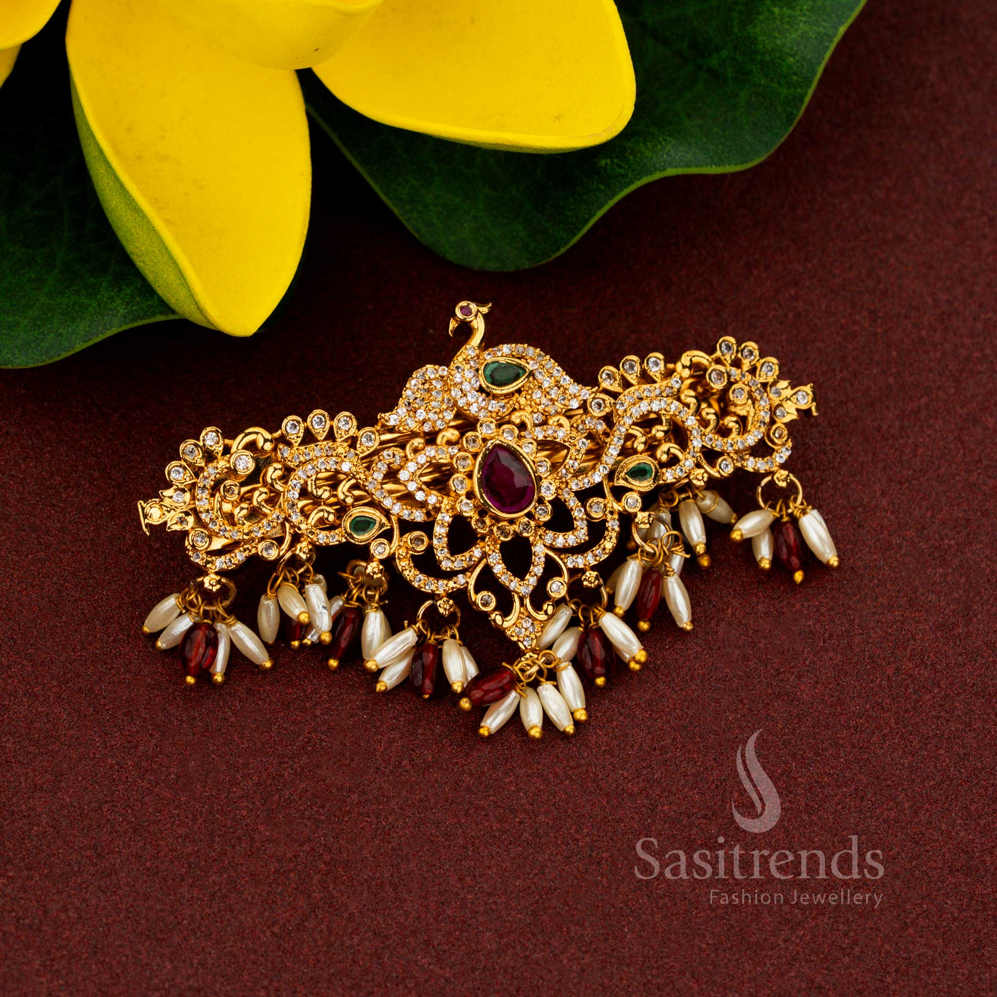 Aristocratic red temple peacock floral hair clip adorned with radiant teardrop AD stones resplendent rice pearls sovereign matte gold craftsmanship and noble artistry created for heritage weddings – Sasitrends