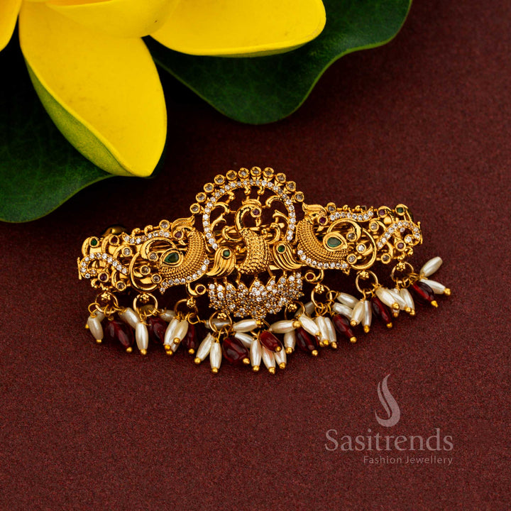 Grandiose red temple triple peacock hair clip adorned with aristocratic matte gold finish lavish AD stone brilliance heritage pearl artistry and resplendent craftsmanship for sovereign weddings – Sasitrends