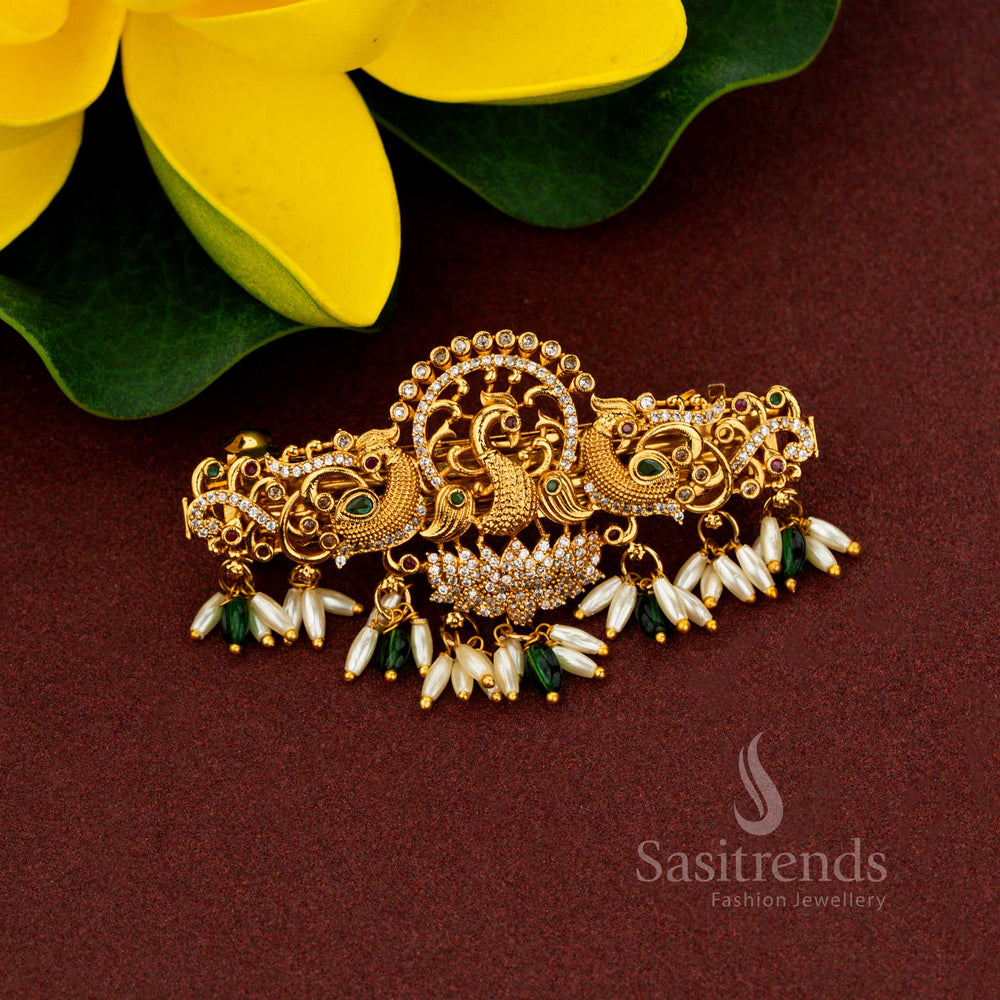 Celestial green triple peacock hair clip designed with noble matte gold grandeur resplendent AD stone detailing eternal pearl richness and magnificent artistry created for regal bridal occasions – Sasitrends