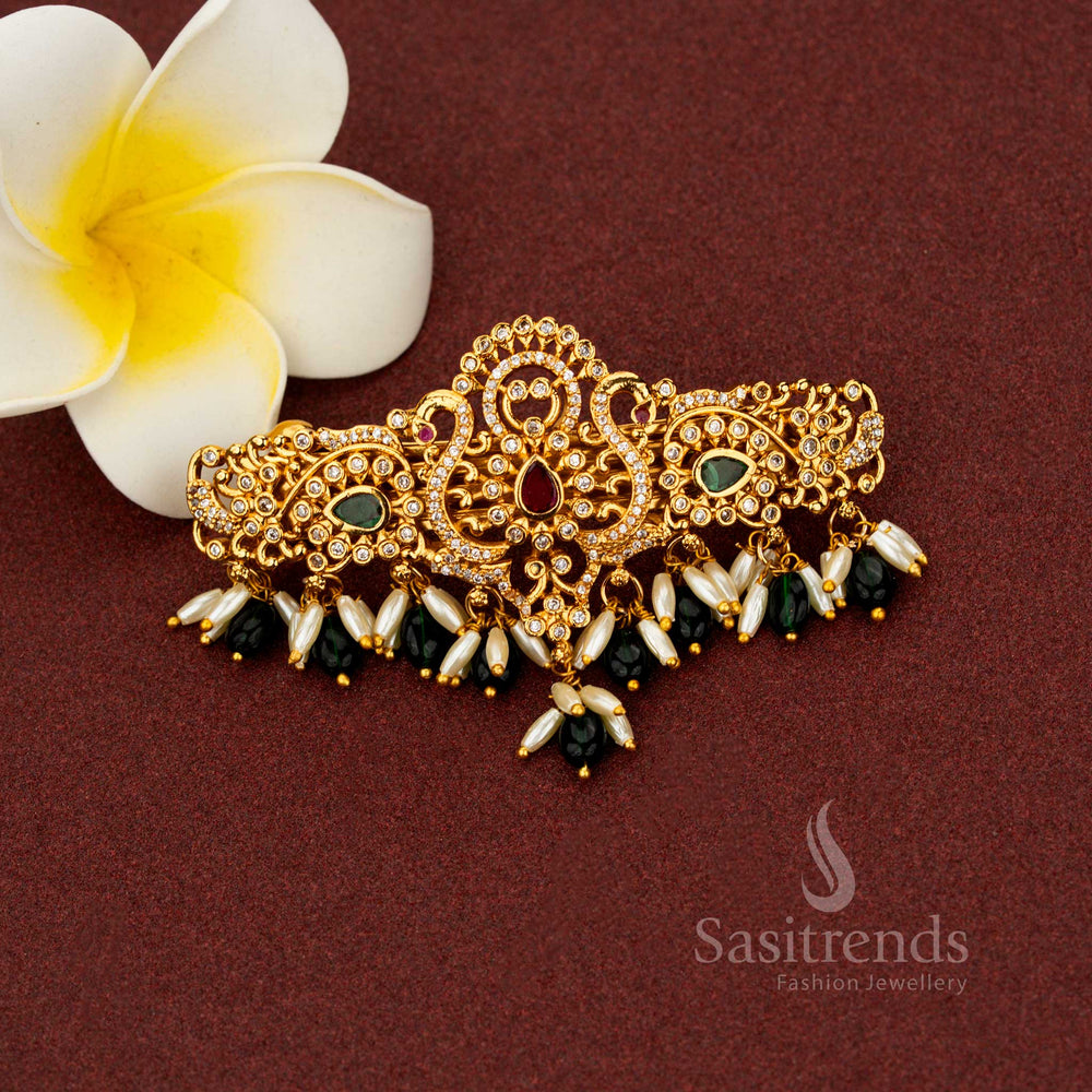 Exalted green teardrop floral hair clip crafted in matte gold with AD accents, heritage artistry, and elegant rice pearl danglers – Sasitrends