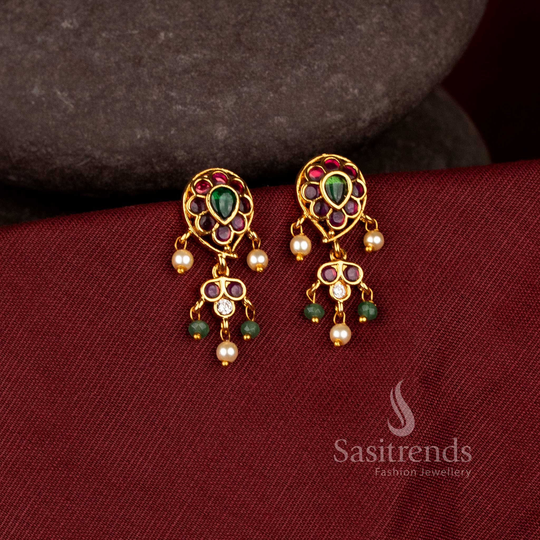 Beautiful paisley flower matte gold plated drop earrings with ad stones - Sasitrends