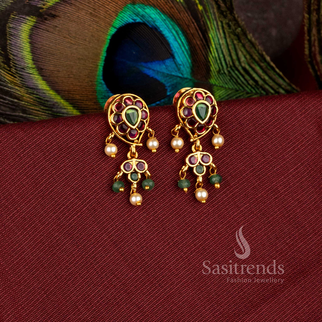 Beautiful paisley flower matte gold plated drop earrings with ad stones - Sasitrends