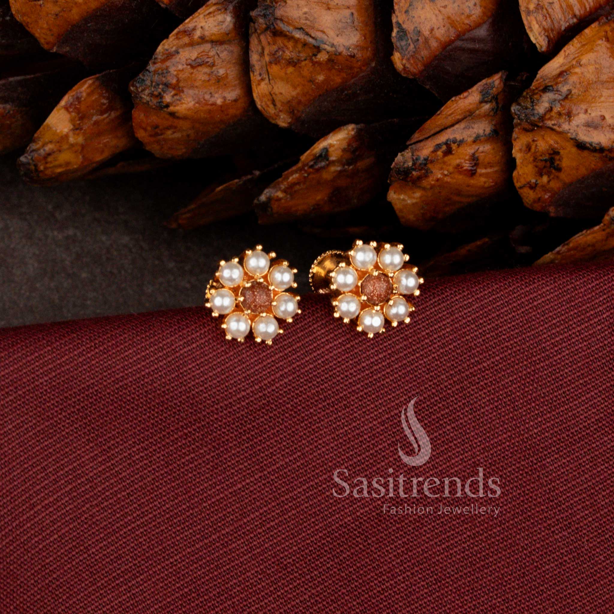 Stylish micro gold plated floral stud earrings with sparkling Black AD stones.