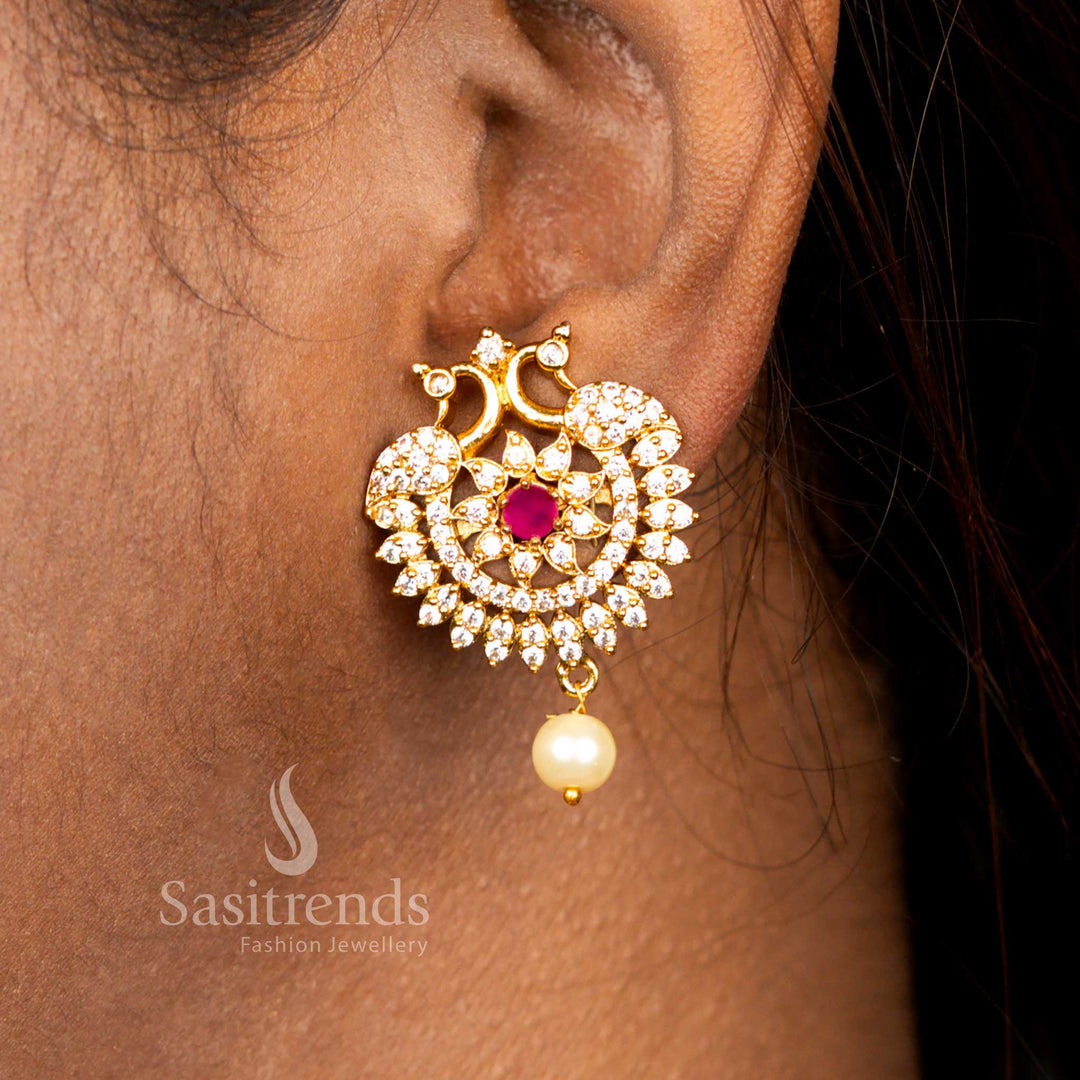 Sasitrends matte gold plated peacock earrings with american diamond changeable stones and pearl drop