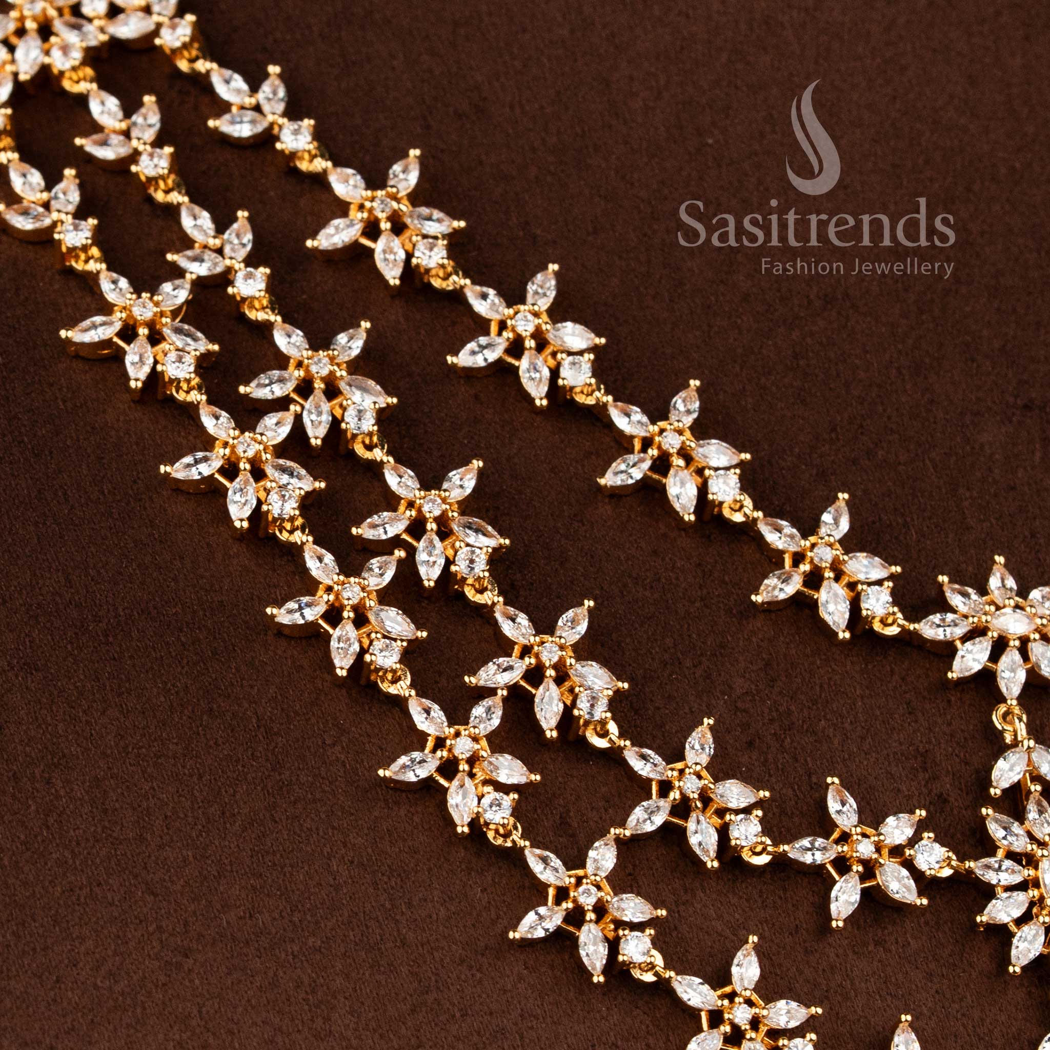 Stylish micro gold plated necklace set with brilliant white marquise AD stones.