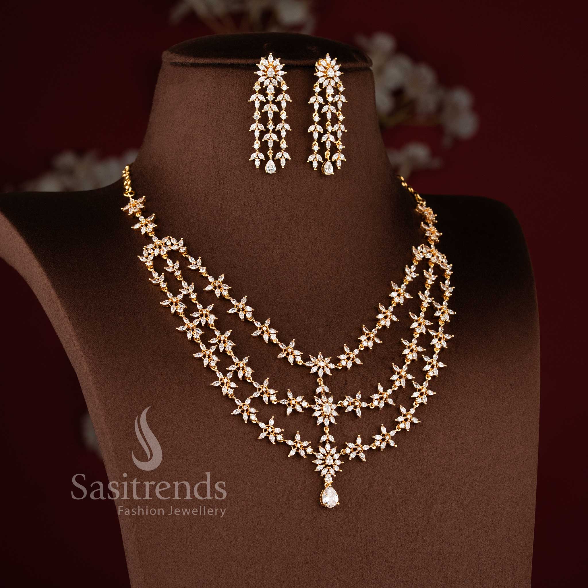 Elegant three-layered micro gold plated American Diamond floral necklace set by Sasitrends
