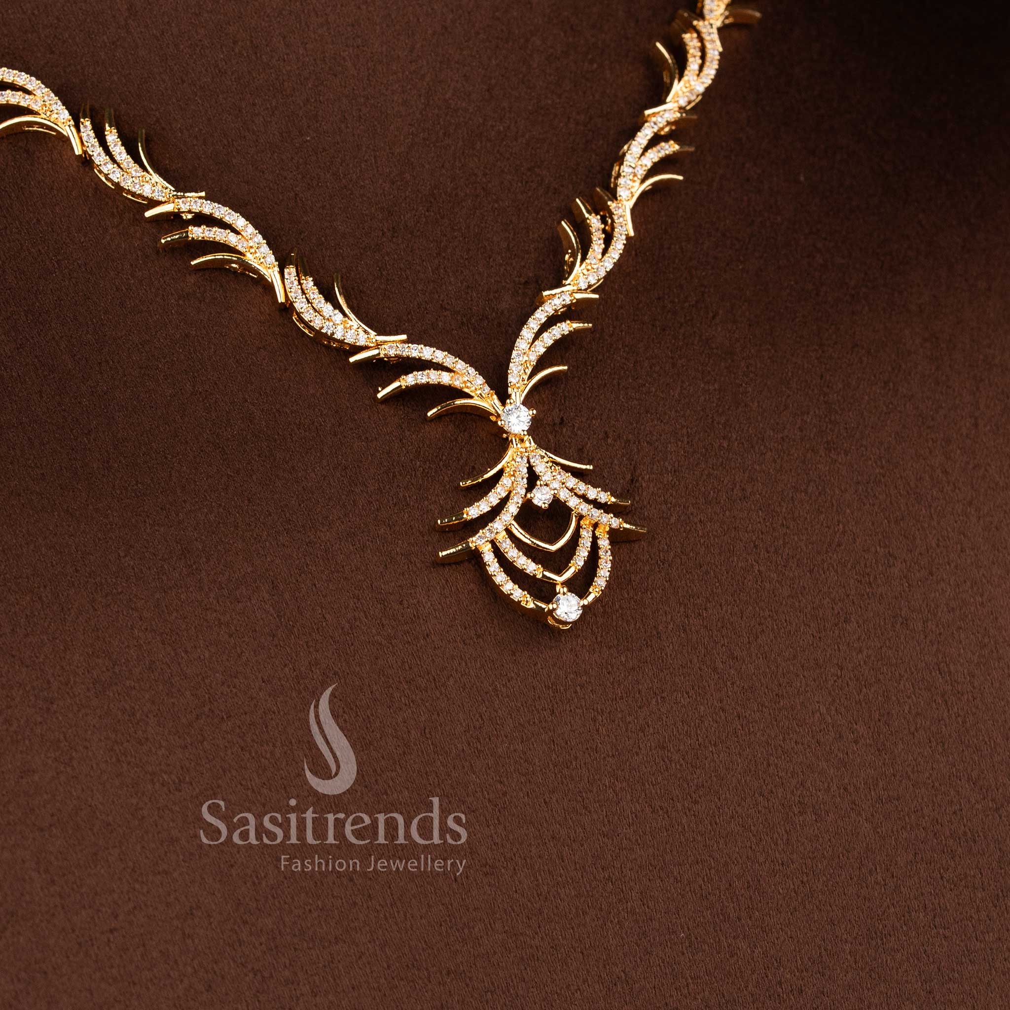 Stylish micro gold plated necklace set with brilliant white American Diamond accents.
