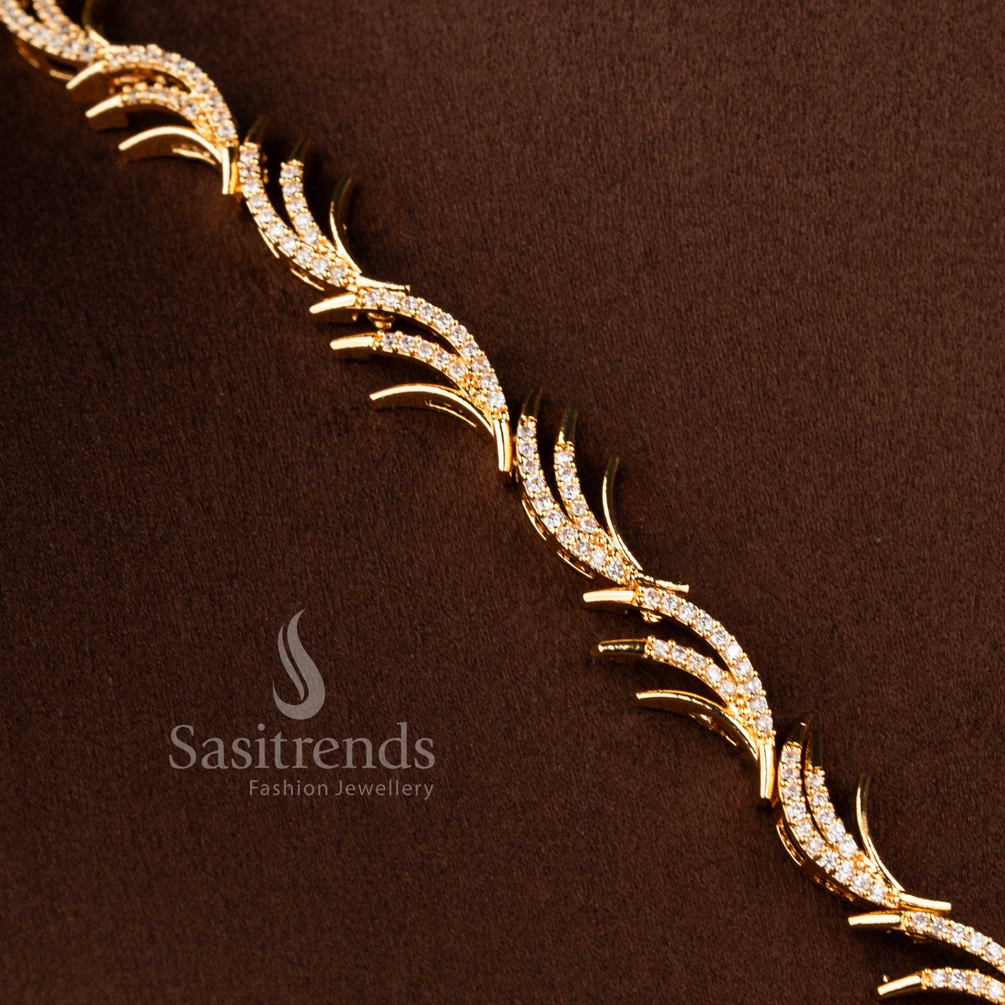 Stylish micro gold plated necklace set with brilliant white American Diamond accents.
