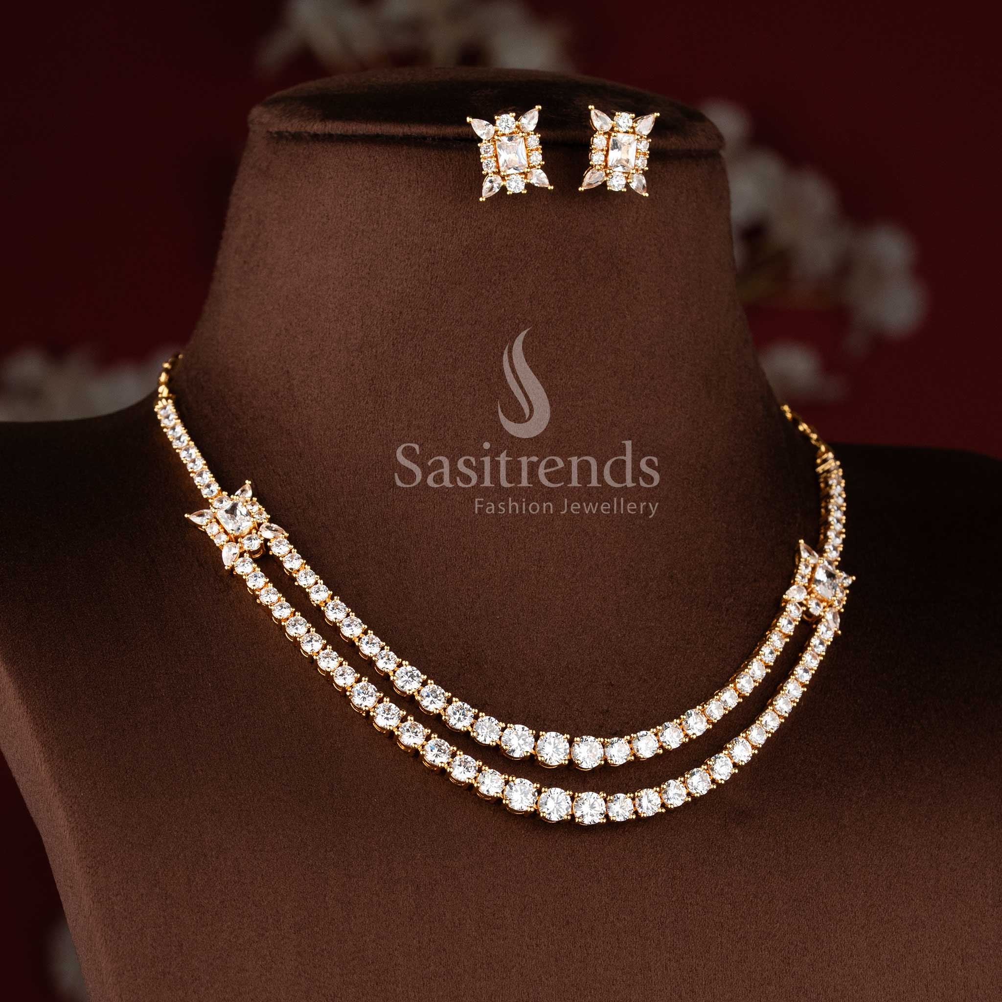 Stylish micro gold plated necklace set with brilliant round and rectangular American Diamonds.