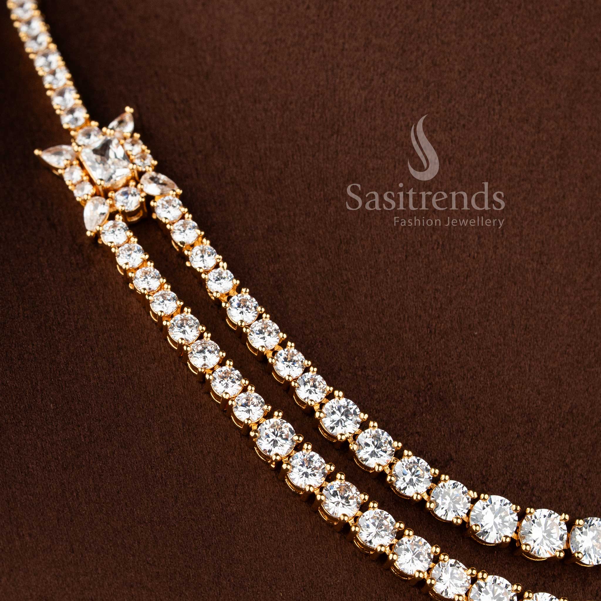 Elegant parallel strand AD stone necklace with matching geometric stud earrings.
