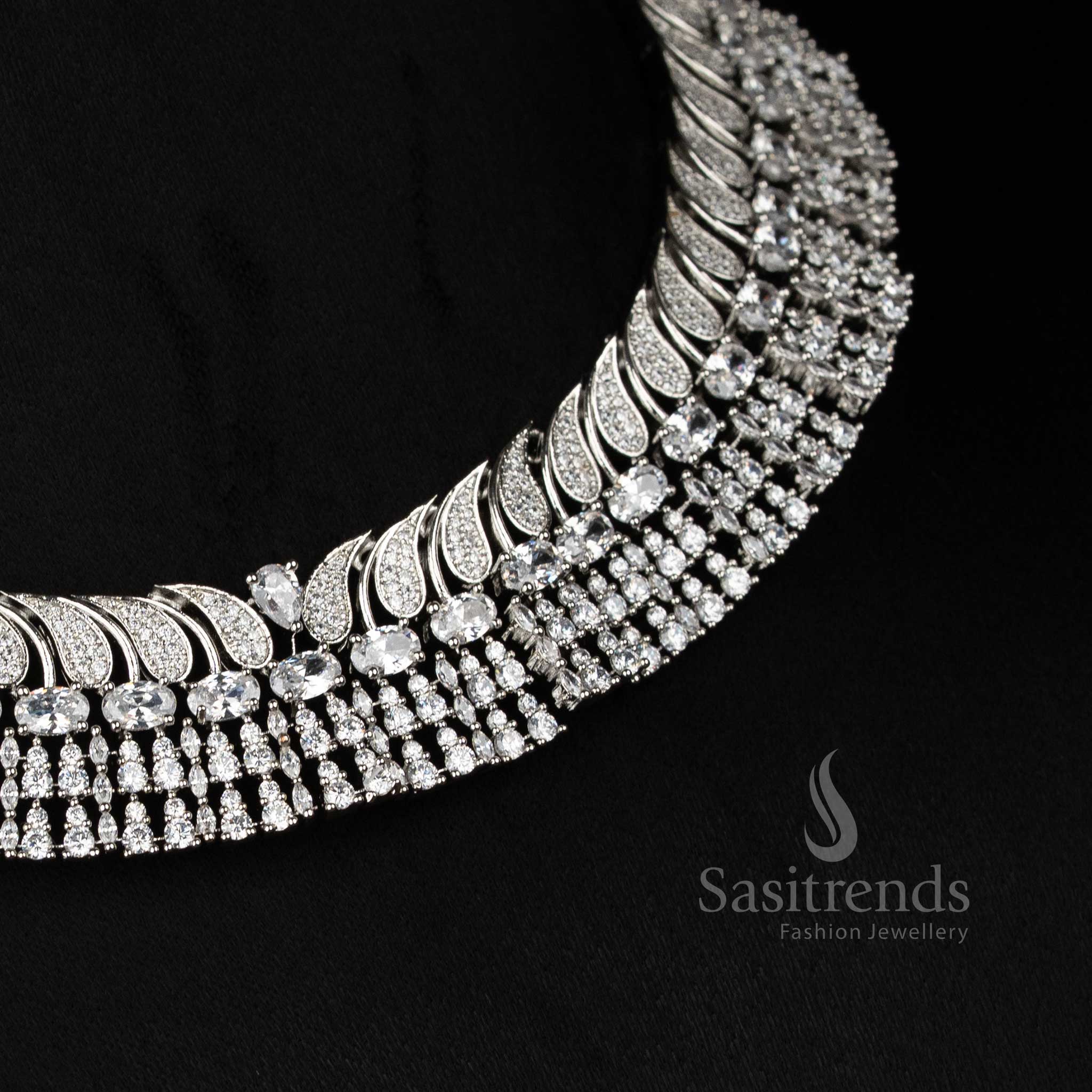 Radiant white rhodium silver plated paisley feather necklace adorned with oval teardrop stones, ideal to wear for temple festivals and family celebrations – Sasitrends