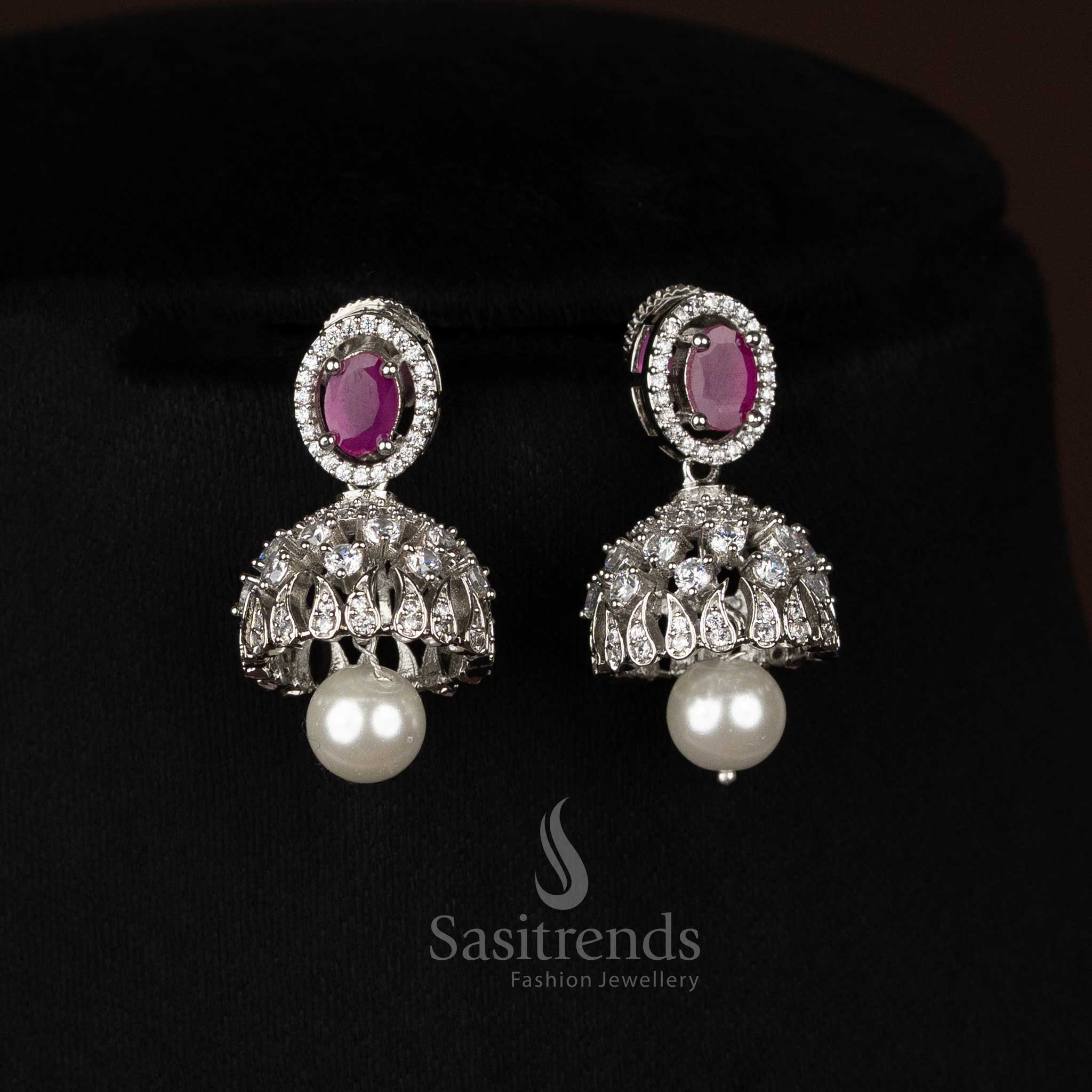 Majestic ruby rhodium silver plated paisley feather drop earrings adorned with oval teardrop stones, perfect to wear for temple ceremonies and traditional gatherings – Sasitrends