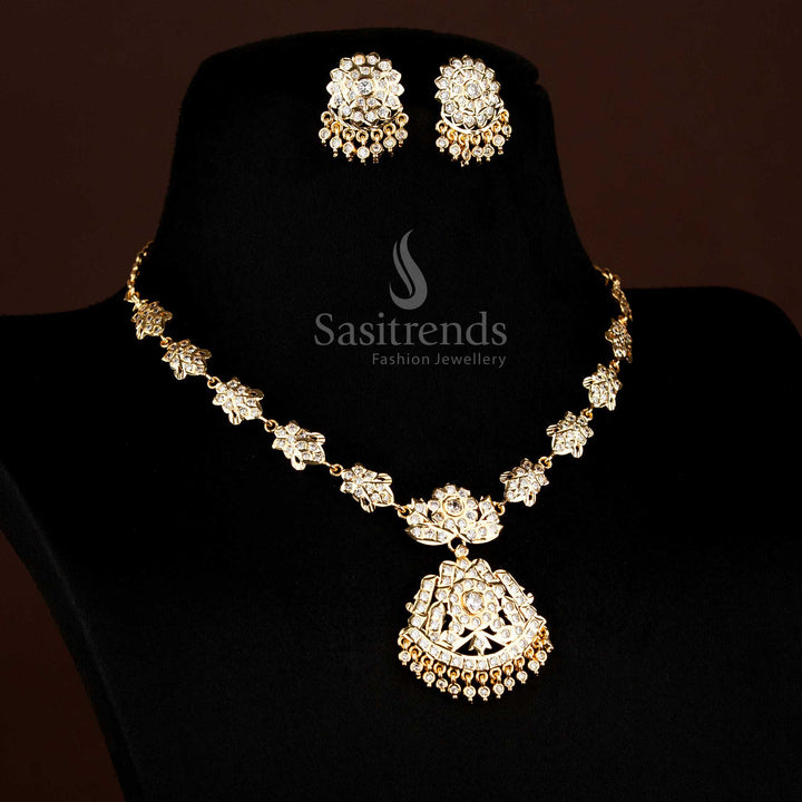 Intricate floral and leaf design structure of the Impon Attigai Micro Gold Plated white AD Stone Necklace set, real gold look  - Sasitrends