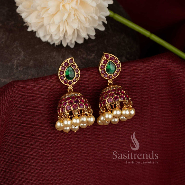 Elegant Matte Gold Plated Dome Jhumkas with Stone Accents and Pearl Hangings - Sasitrends
