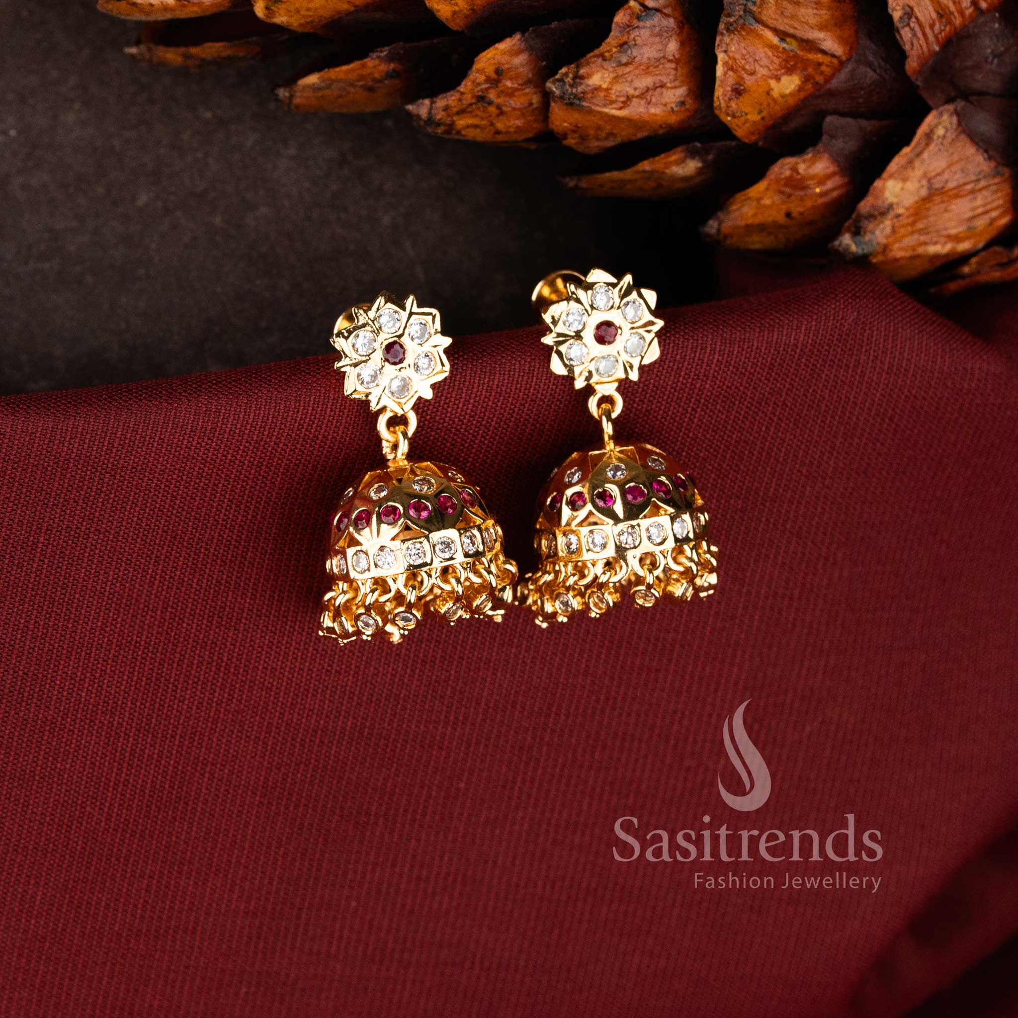 Traditional starburst gold Jhumkas with faceted stone bells for weddings - Sasitrends