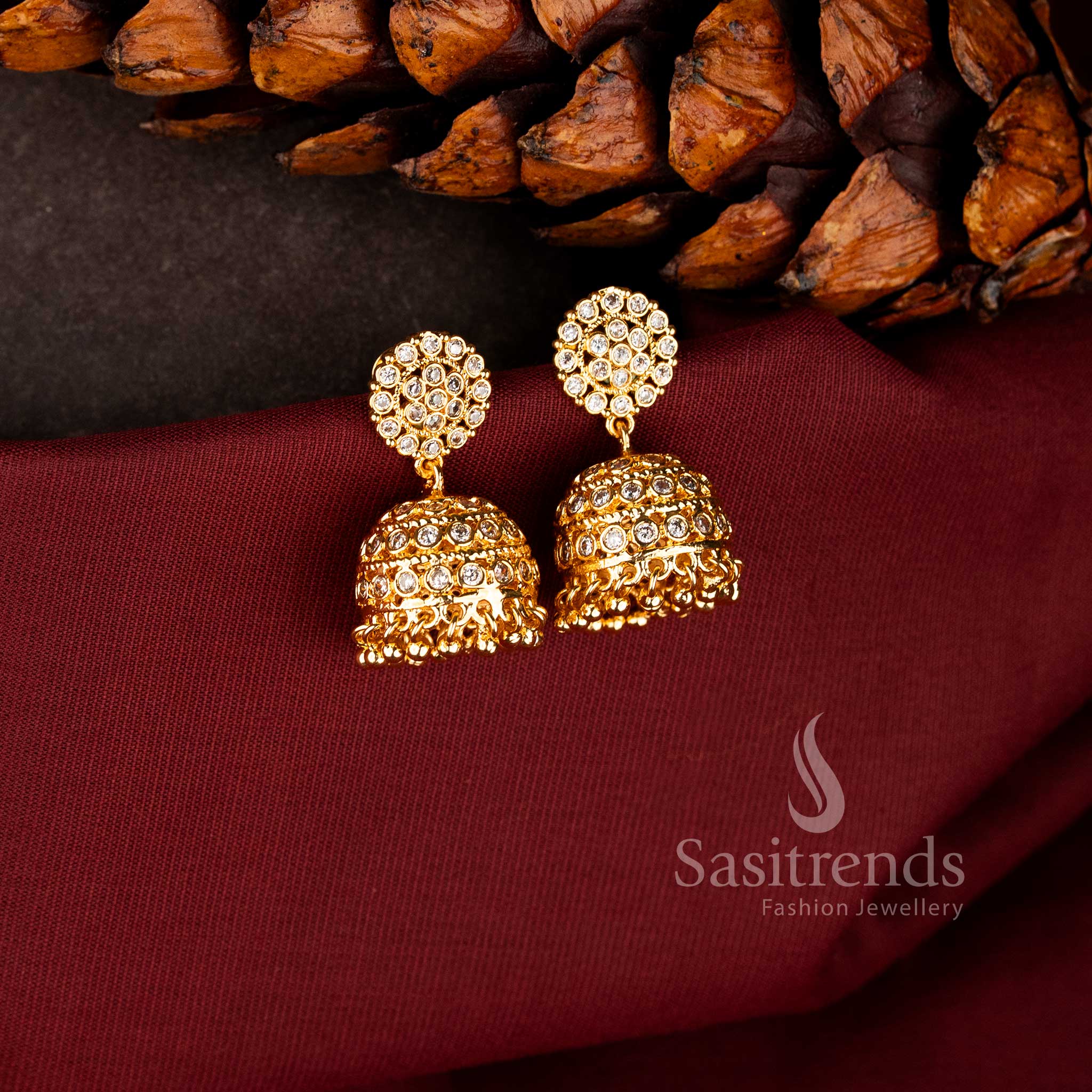 White Impon micro gold plated Floral Dome Jhumka earrings with American Diamond clusters 