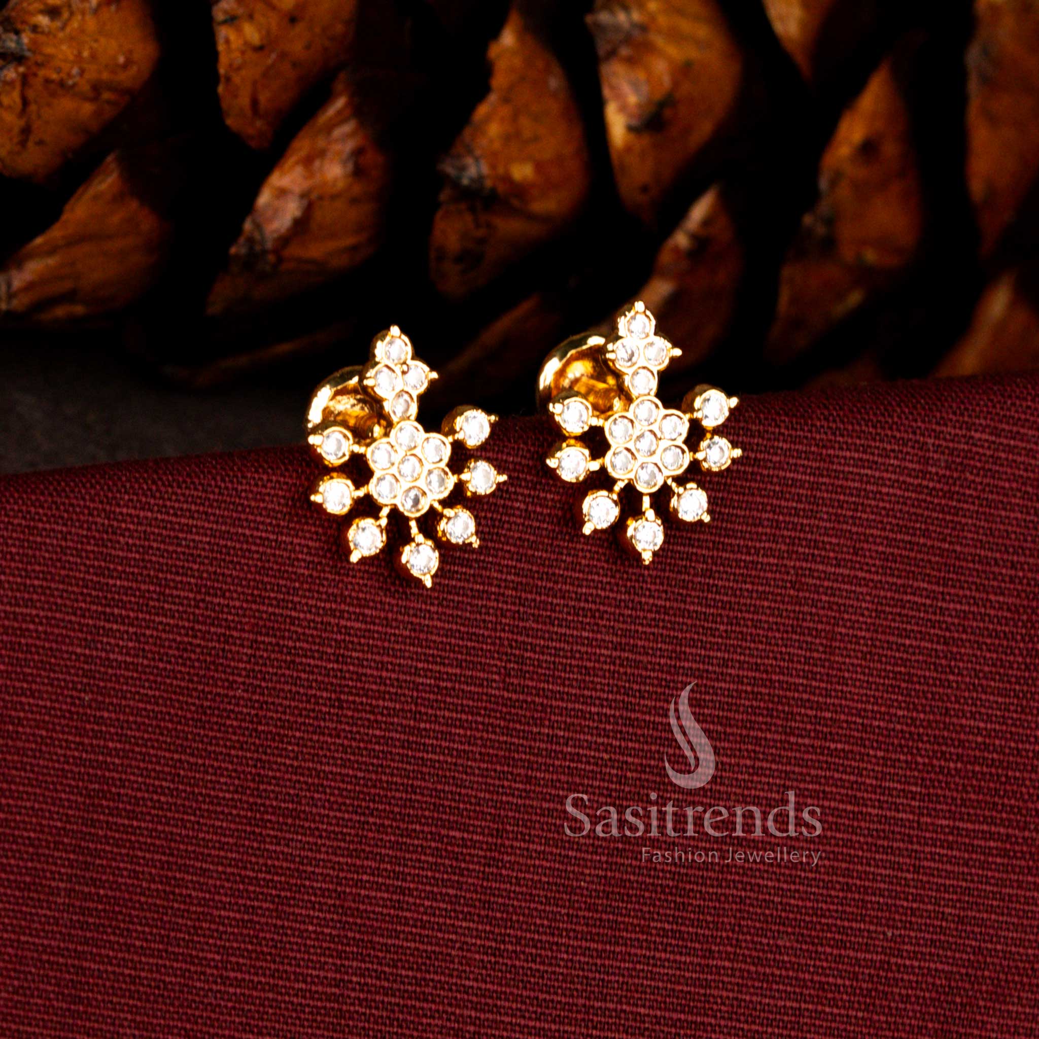 Sasitrends Impon micro gold plated floral white AD stone stud earrings featuring sunburst cluster design with circular stone center and radiant gold finish