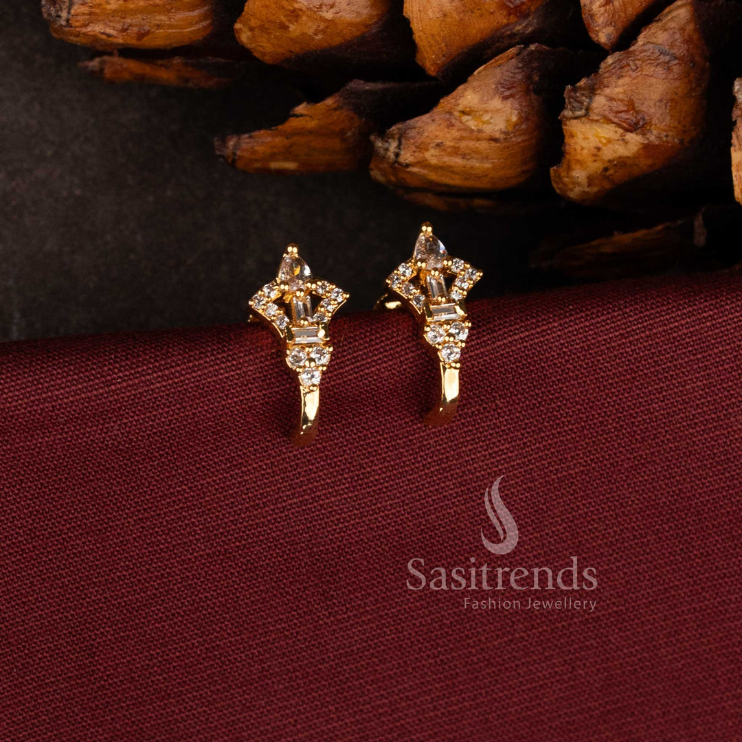 Stylish micro gold plated stud earrings with brilliant white baguette and pear AD stones.