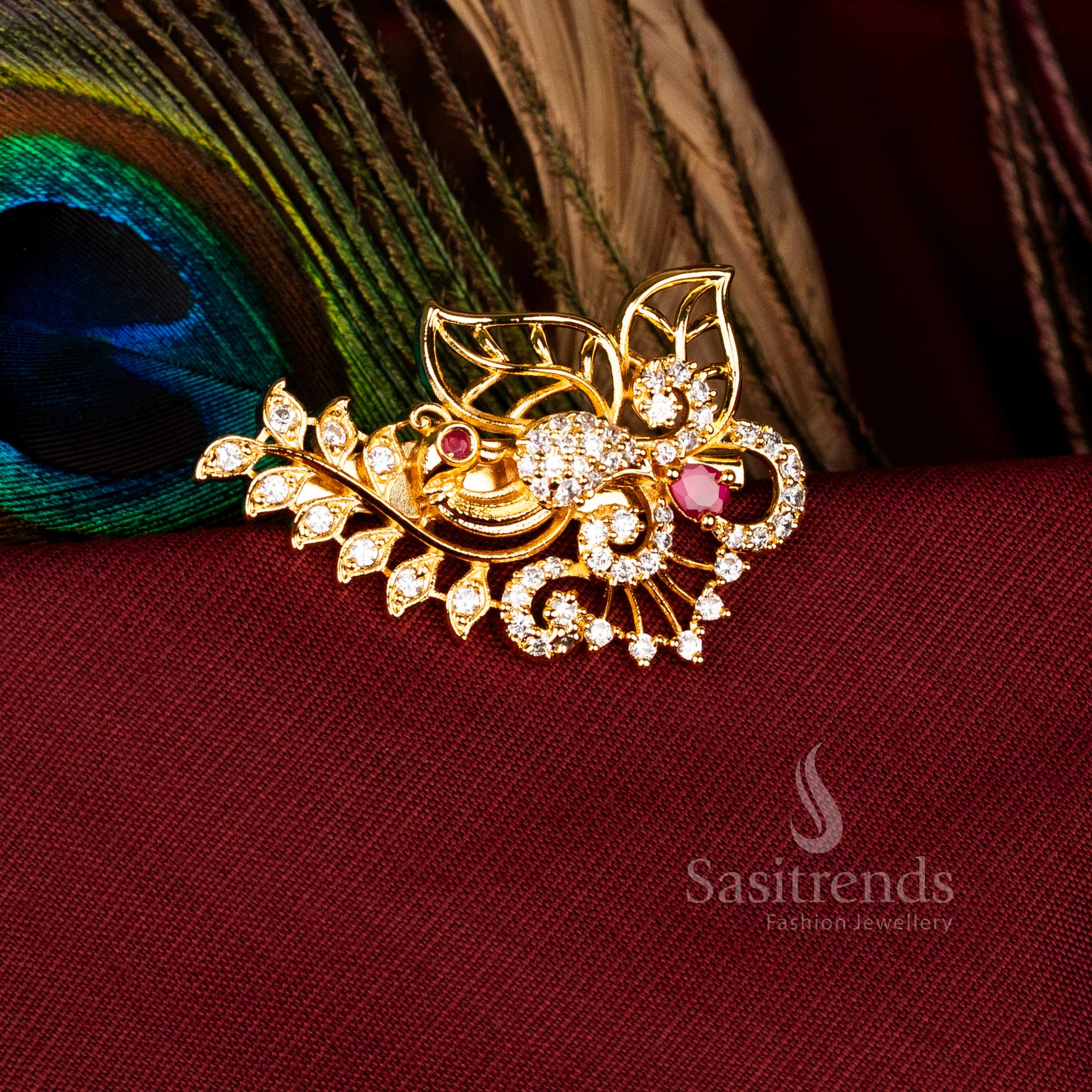 Opulent White-Ruby Peacock Leaf Floral Saree Pin adorned with American Diamonds and Micro Gold Finish, Perfect for Traditional Celebration and Bridal Jewellery – Sasitrends