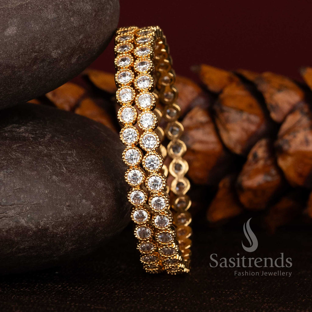 Traditional Impon AD stone bangles with elegant gold finish by Sasitrends