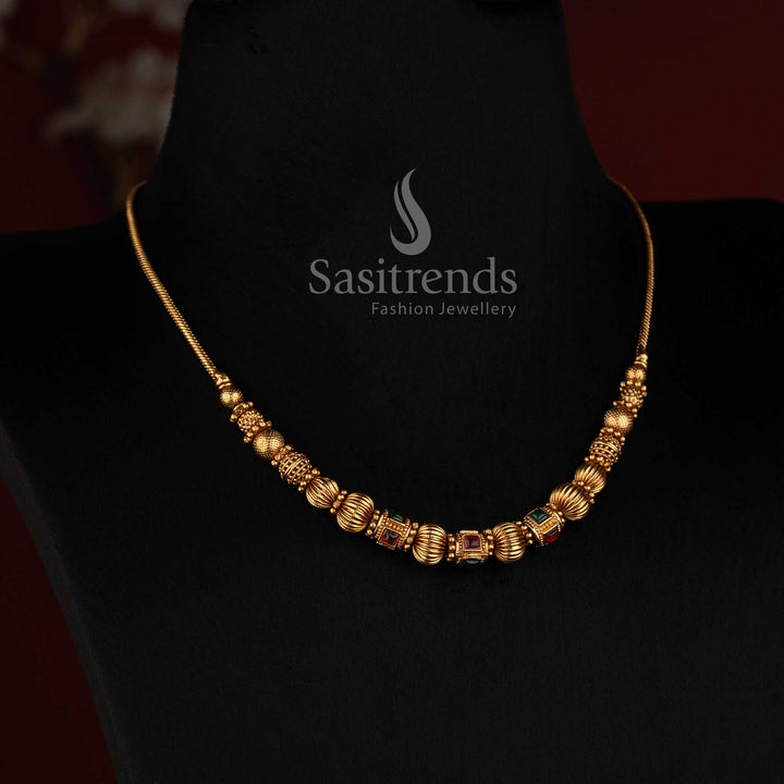 2760 Sasitrends matte gold plated temple necklace with textured ornamental beads and classic ball chain detailing