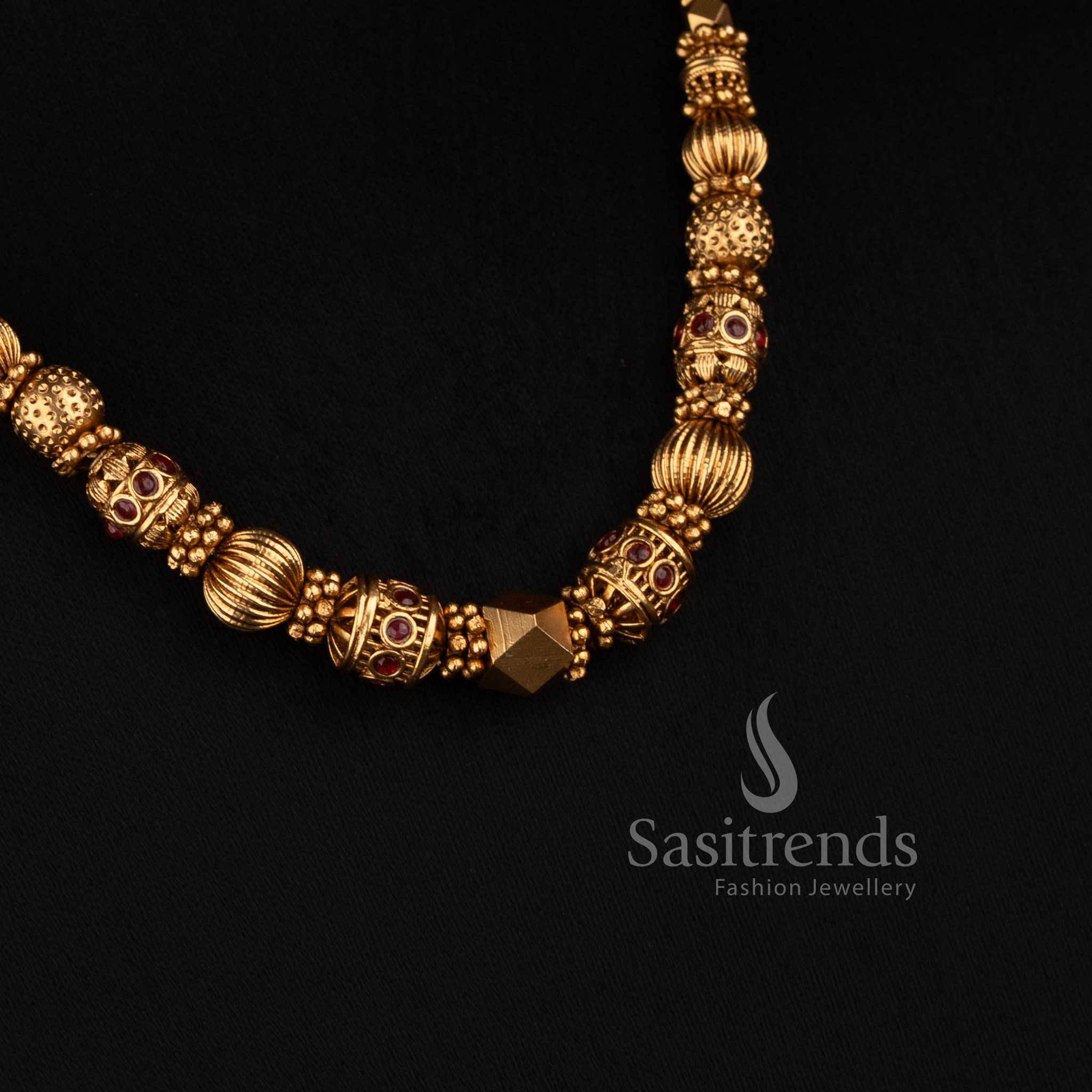 2760 traditional temple jewellery necklace with matte gold finish sculpted motifs and ornamental textured beads