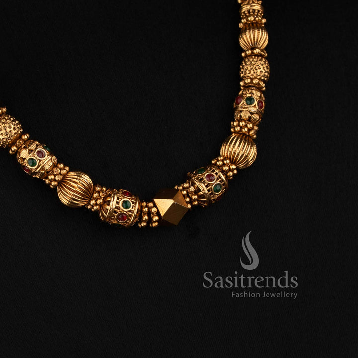 2760 matte gold plated traditional temple necklace with ball chain design sculpted motifs and centre ball detail