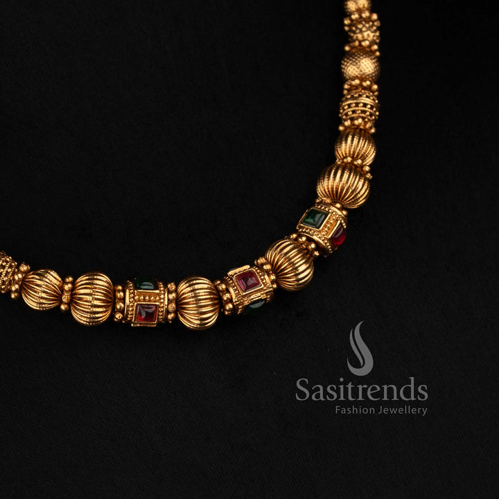 2760 traditional matte gold temple necklace featuring ball chain design ornamental beads and sculpted motifs