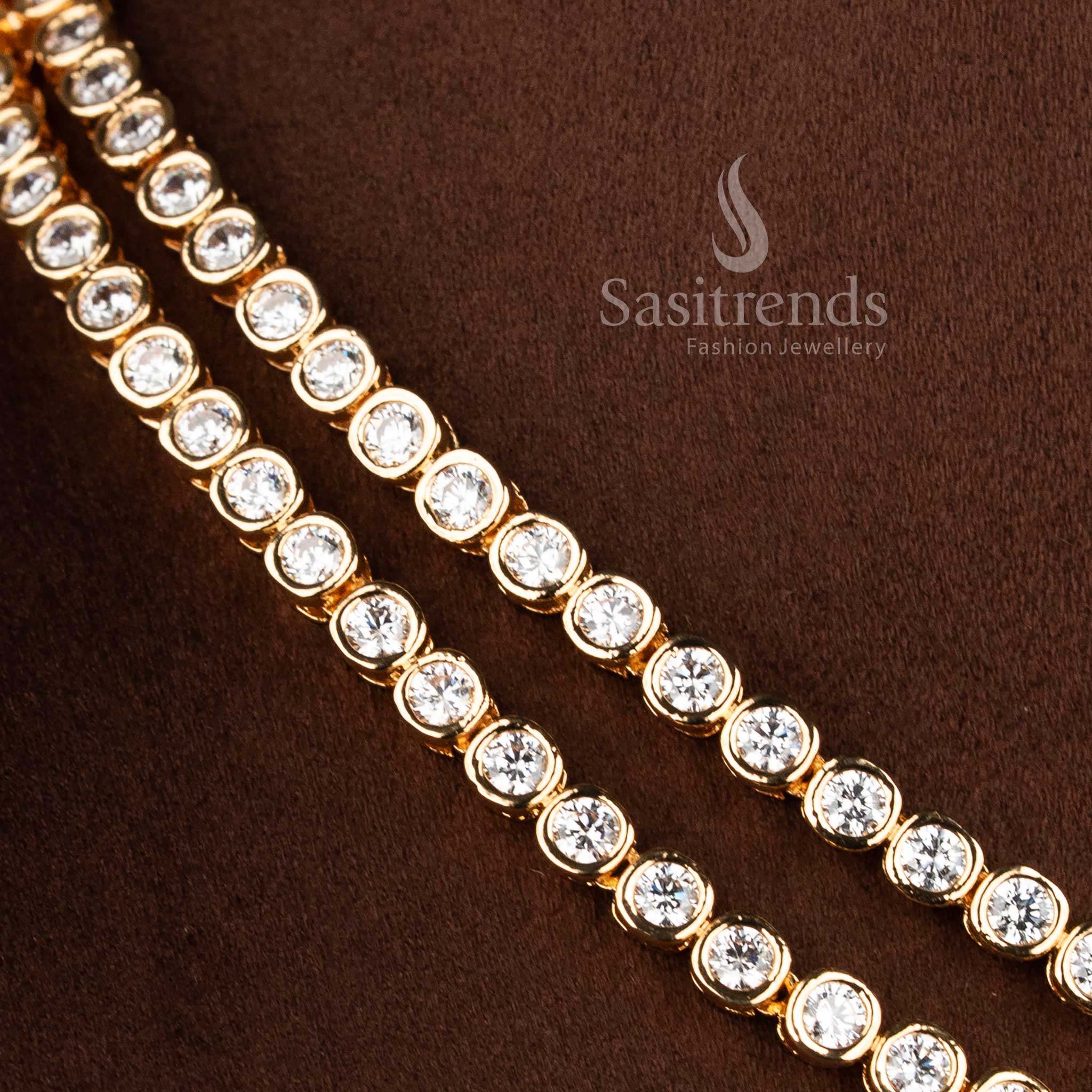 Bridal wear matte gold plated necklace set with layered chain pattern and premium white stone embellishments - Sasitrends
