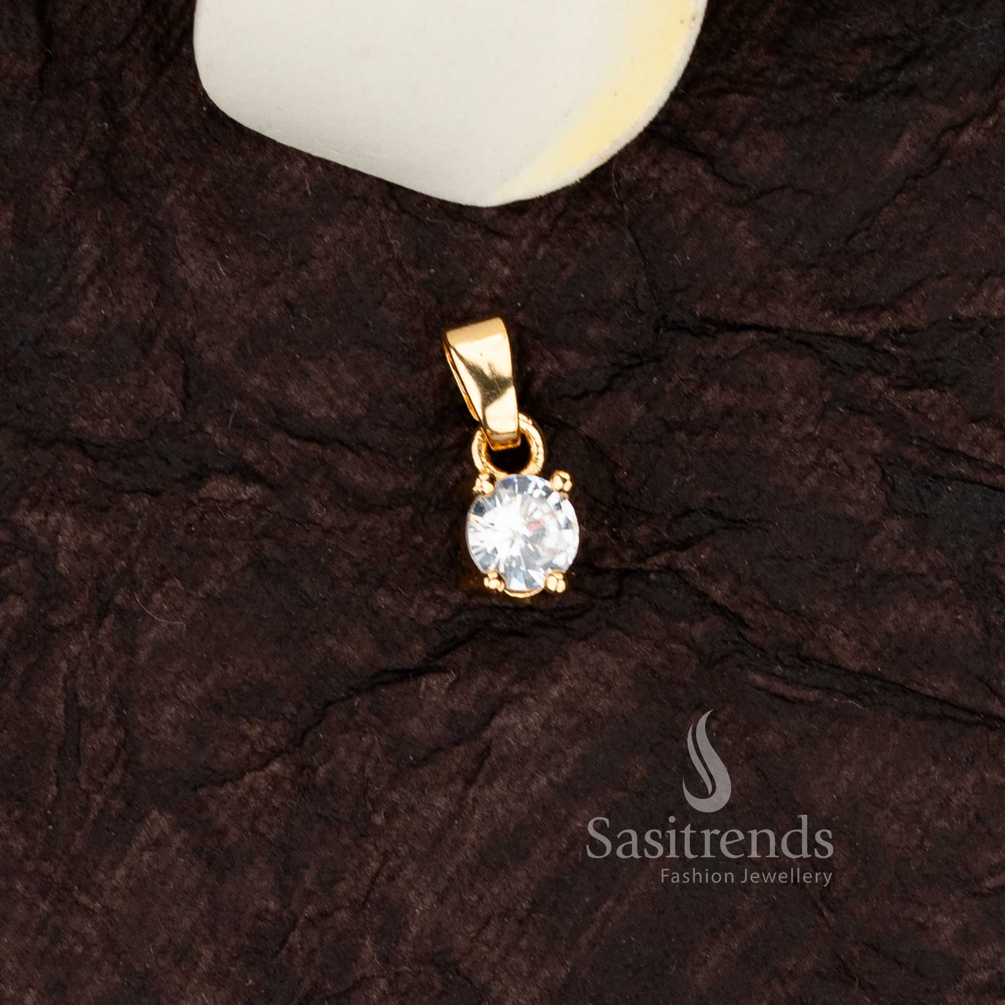 Timeless micro gold plated solitaire pendant with a single sparkling american diamond - Sasitrends