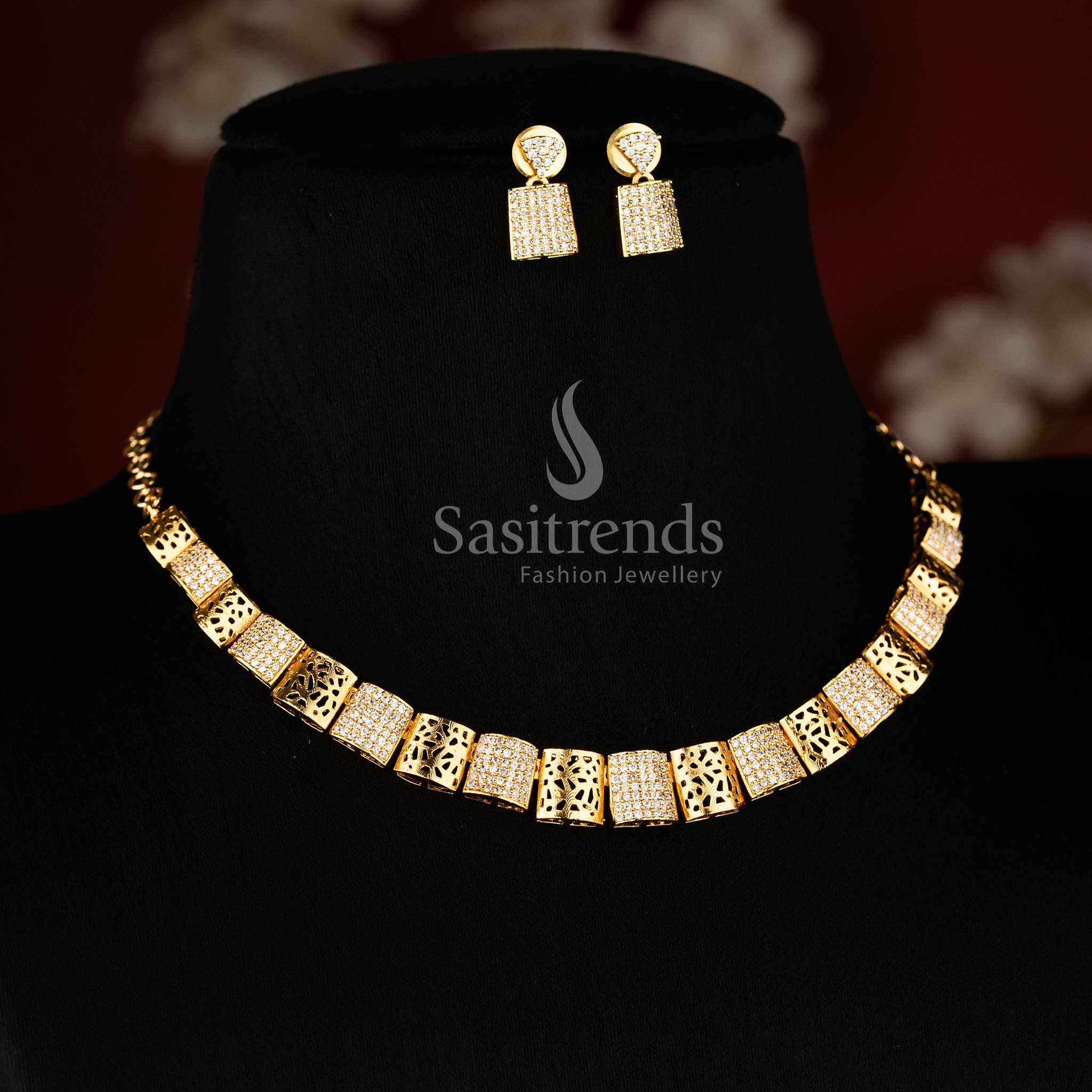 Elegant AD necklace set with structured geometric design and matte gold plated finish 