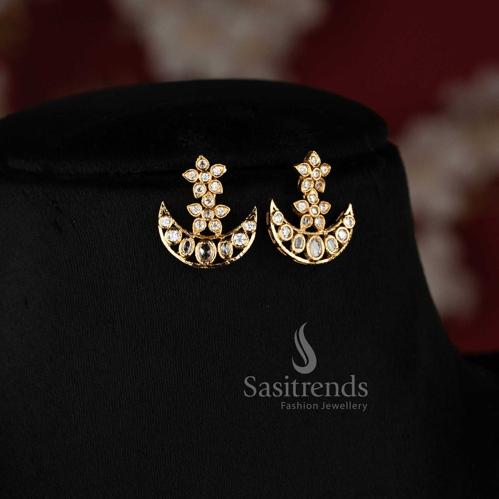 Matching celestial-themed earrings with a floral stud and crescent moon base encrusted with brilliant white stones 2765J - Sasitrends
