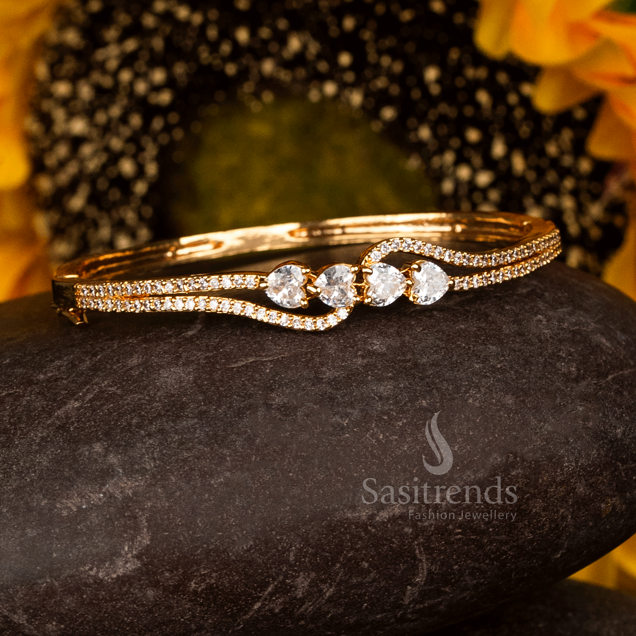 Attractive Micro Gold Plated American Diamond  Openable Kada Bracelet with four white heart-inspired stones and American Diamond accents - Sasitrends